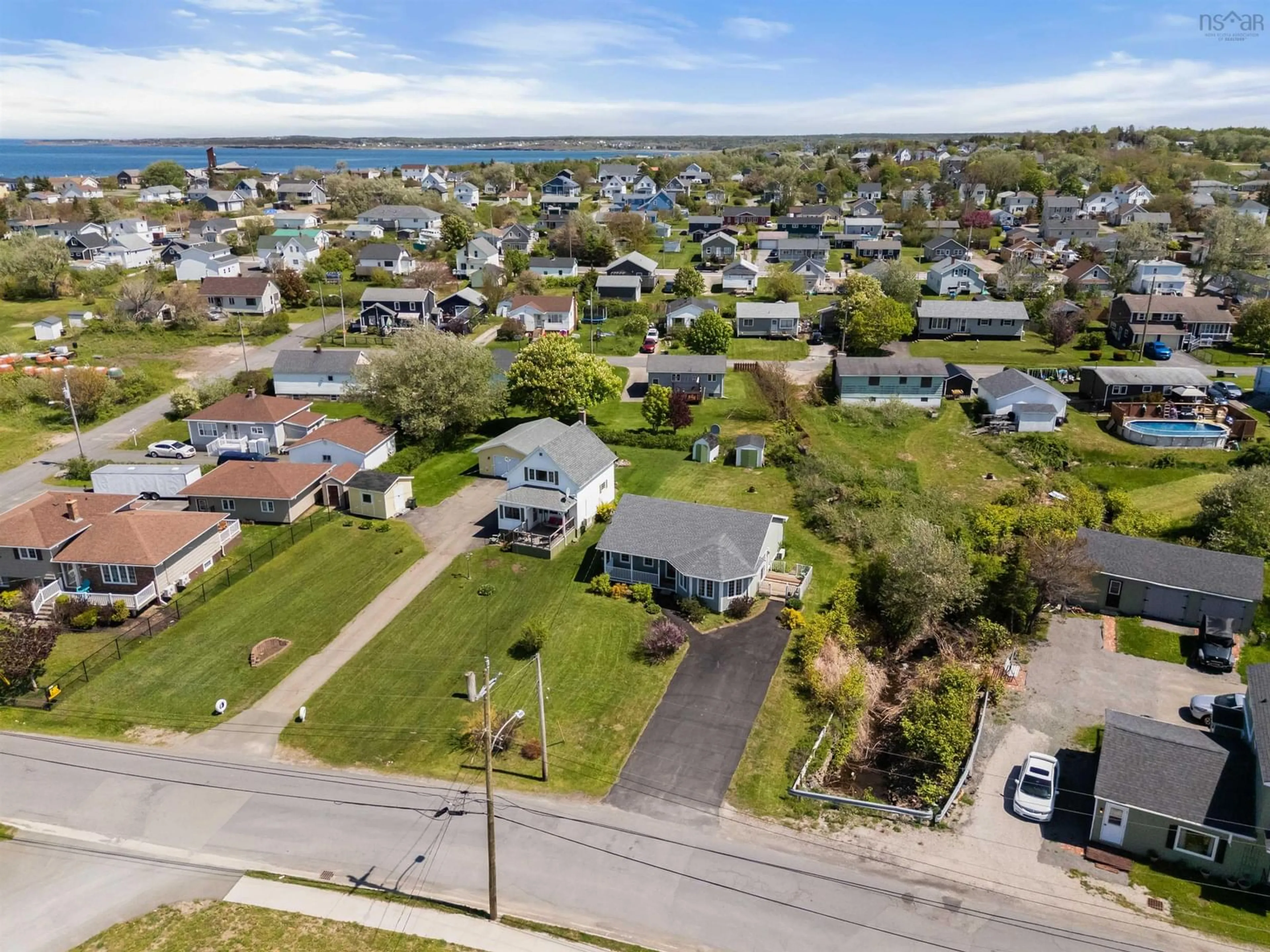 A pic from outside/outdoor area/front of a property/back of a property/a pic from drone, water/lake/river/ocean view for 34 Water St, Glace Bay Nova Scotia B1A 1R3