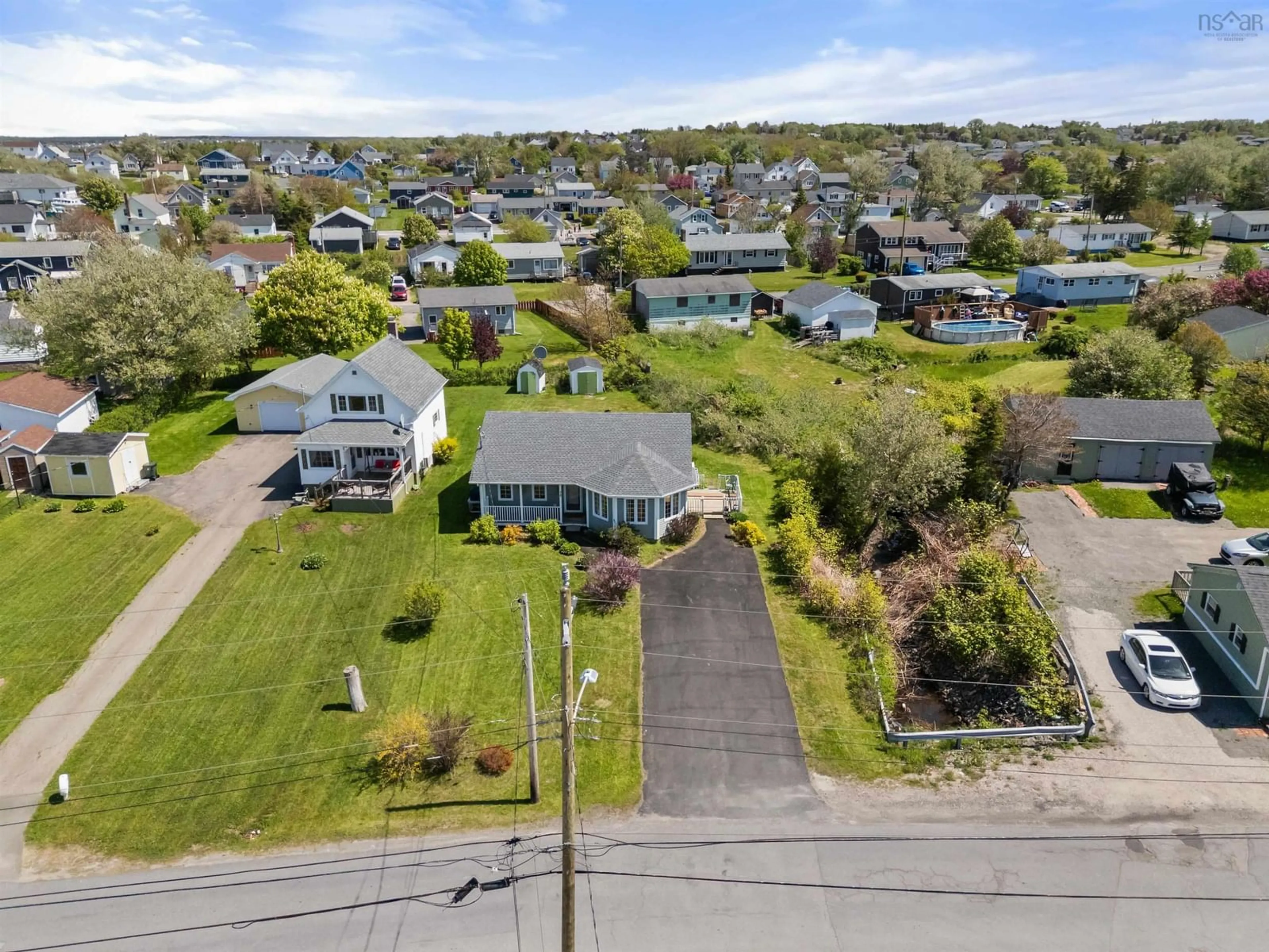 A pic from outside/outdoor area/front of a property/back of a property/a pic from drone, water/lake/river/ocean view for 34 Water St, Glace Bay Nova Scotia B1A 1R3