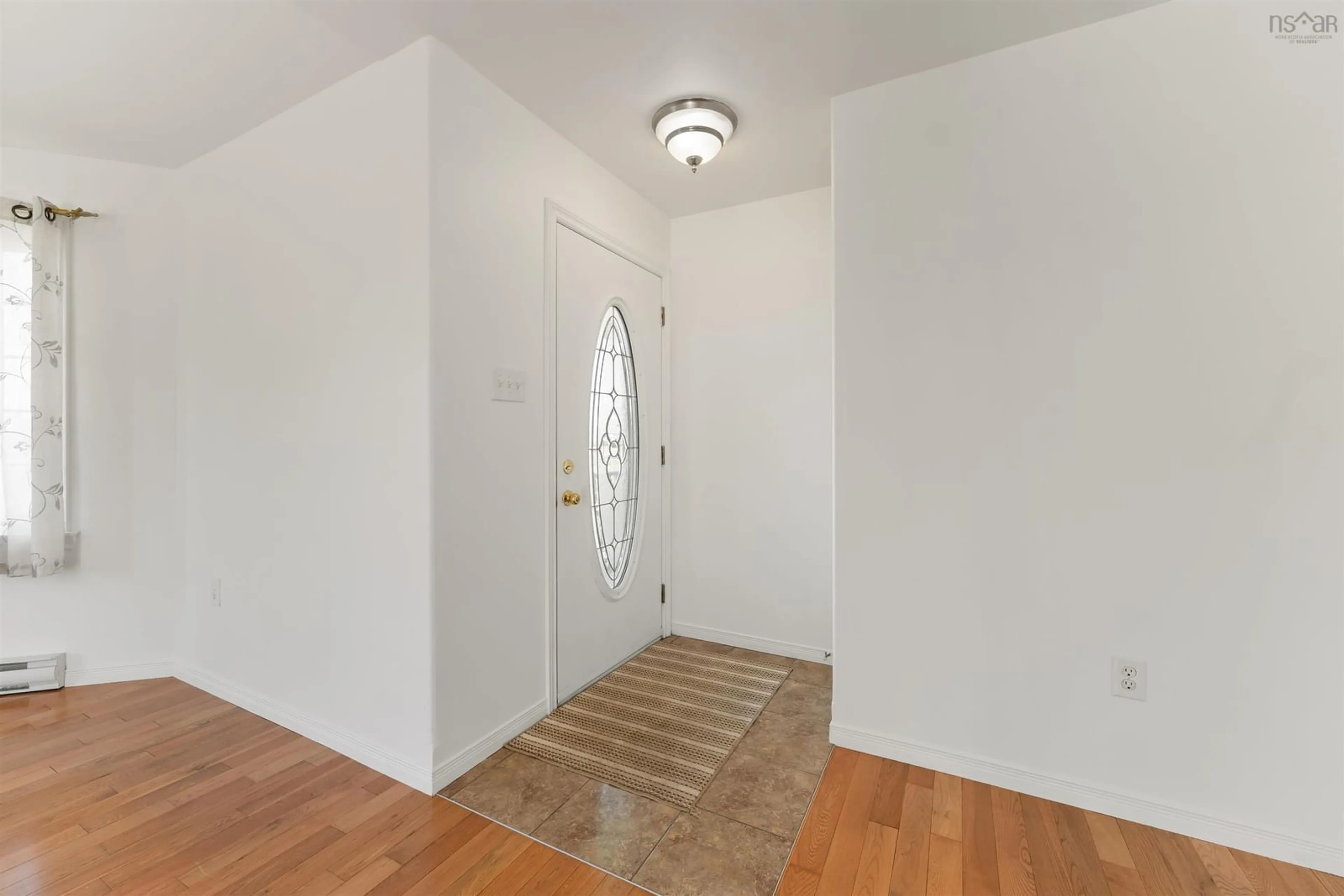 Indoor entryway for 34 Water St, Glace Bay Nova Scotia B1A 1R3