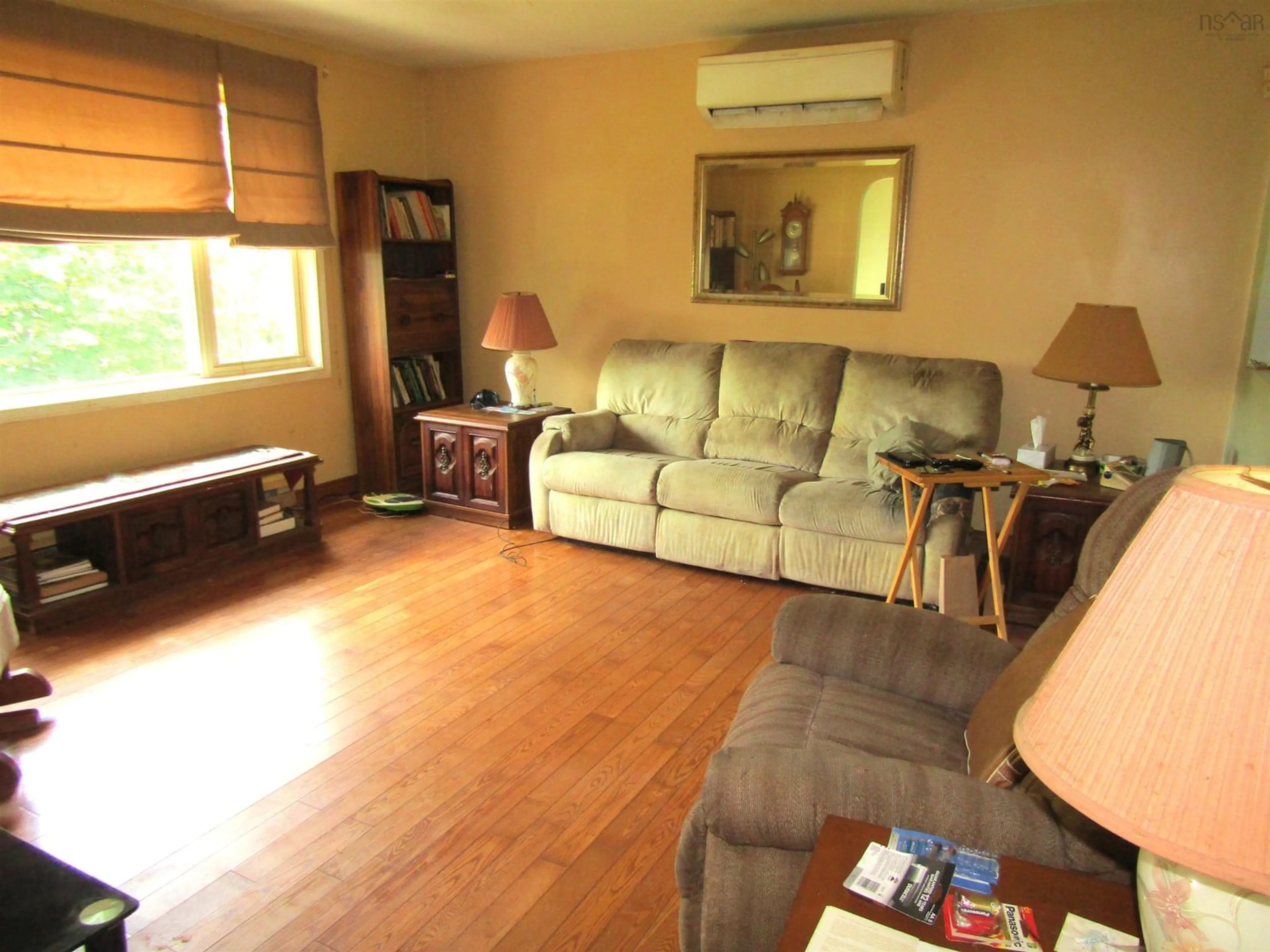 Living room with furniture, wood/laminate floor for 7 Circle Dr, Lake Echo Nova Scotia B3E 1C8