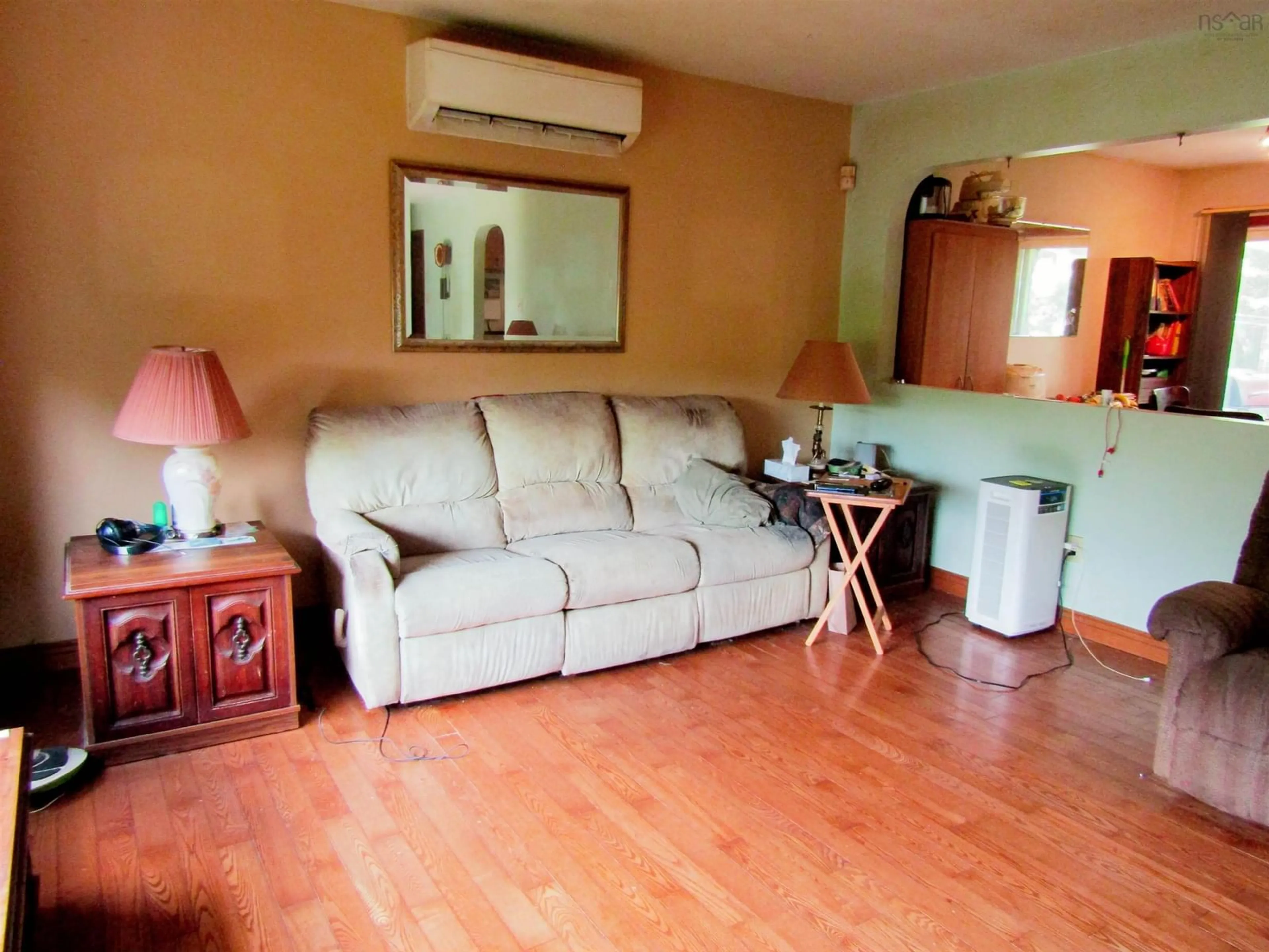 Living room with furniture, wood/laminate floor for 7 Circle Dr, Lake Echo Nova Scotia B3E 1C8