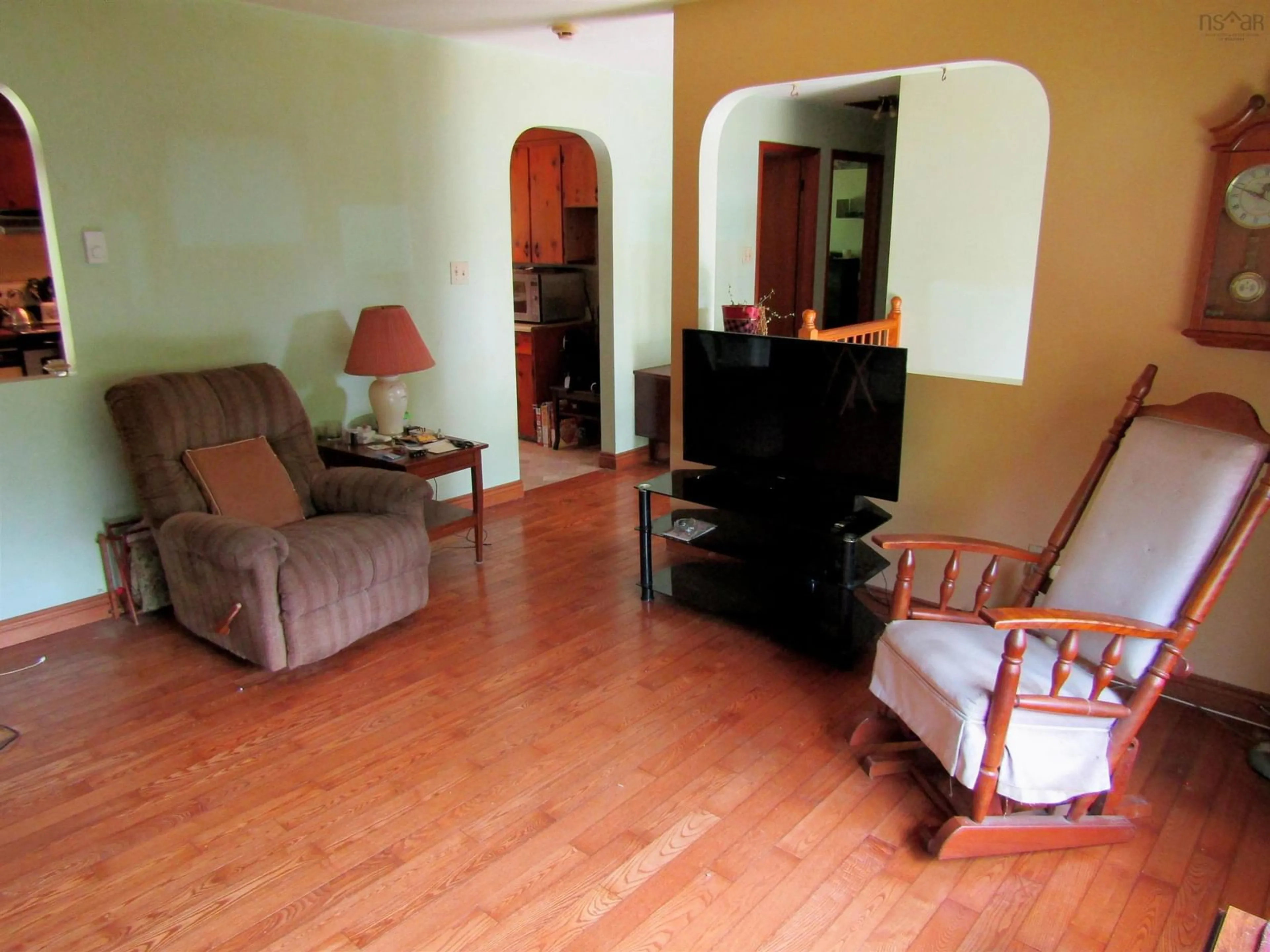 Living room with furniture, wood/laminate floor for 7 Circle Dr, Lake Echo Nova Scotia B3E 1C8