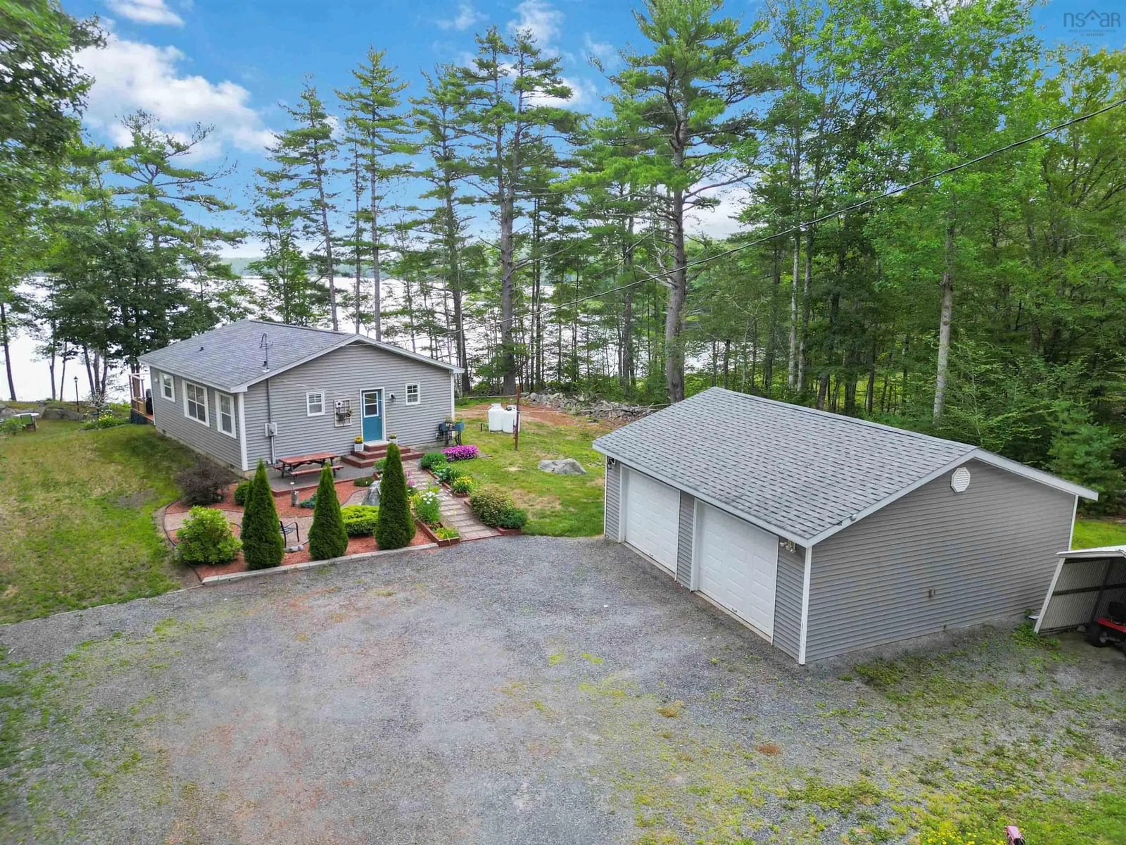 A pic from outside/outdoor area/front of a property/back of a property/a pic from drone, water/lake/river/ocean view for 78 Harbour Acres Rd, Molega Nova Scotia B0T 1E0