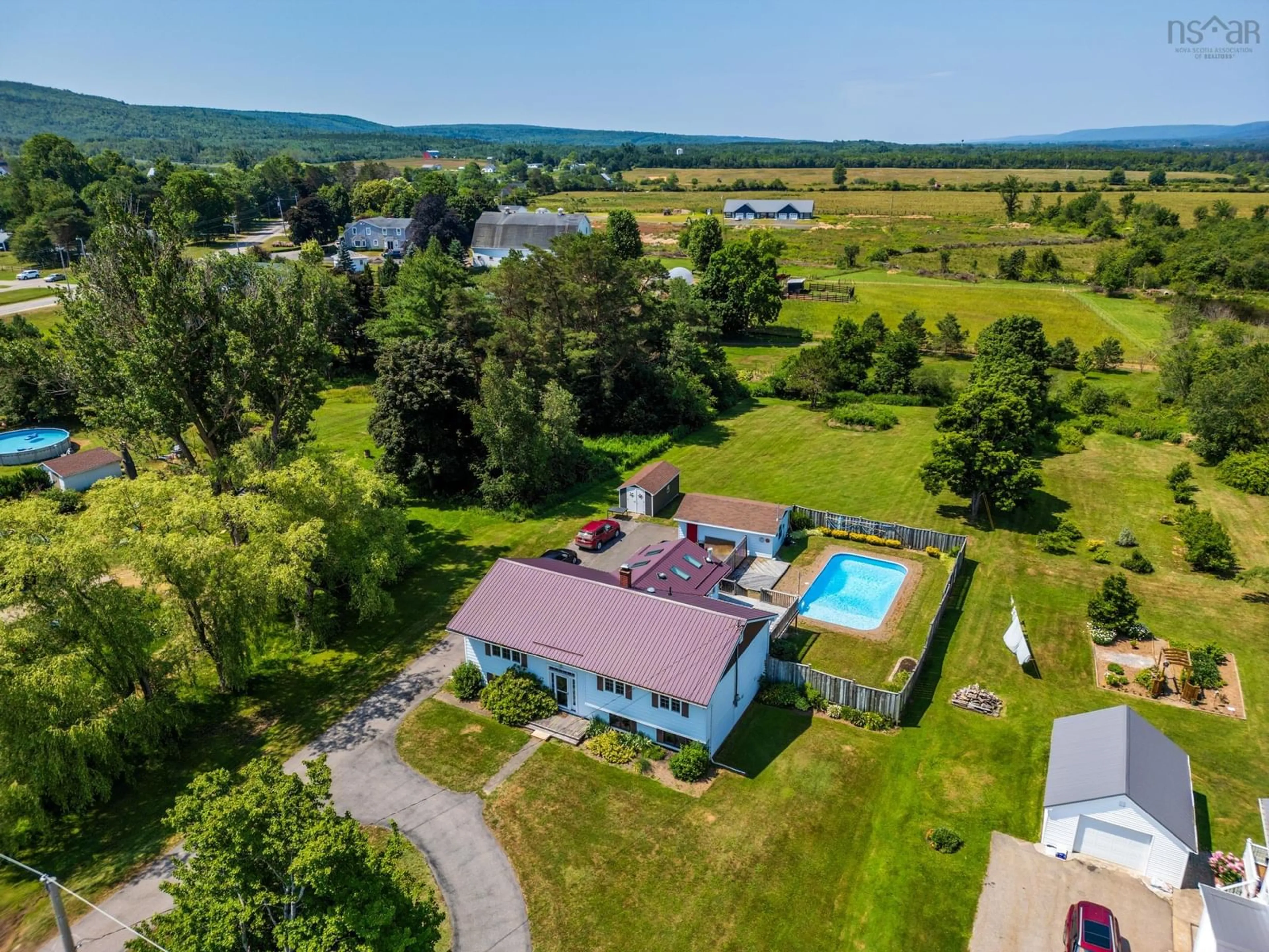 A pic from outside/outdoor area/front of a property/back of a property/a pic from drone, water/lake/river/ocean view for 29 South Street, Carleton Corner Nova Scotia B0S 1C0