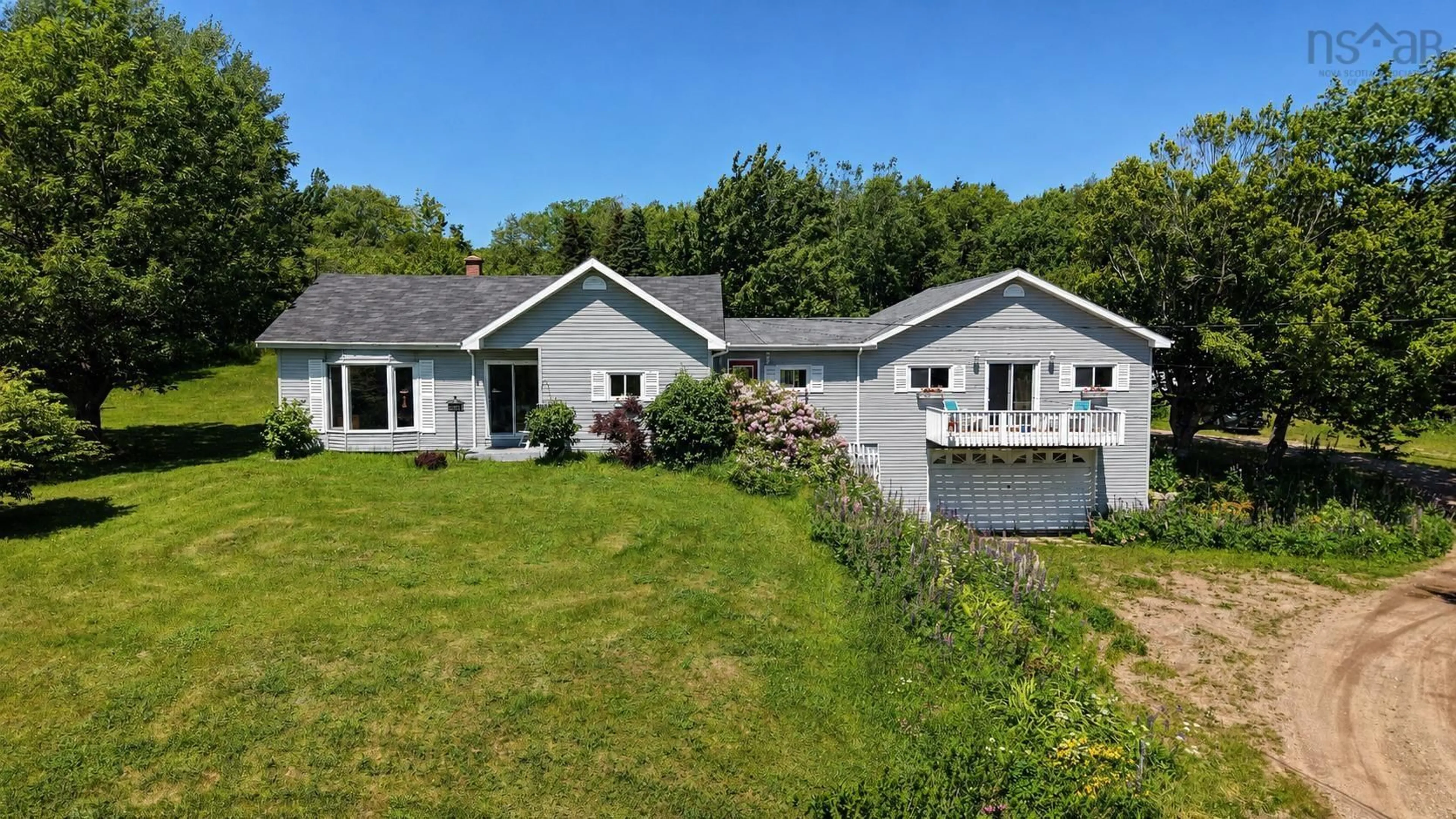 A pic from outside/outdoor area/front of a property/back of a property/a pic from drone, water/lake/river/ocean view for 29389 Cabot Trail, Cape North Nova Scotia B0C 1G0