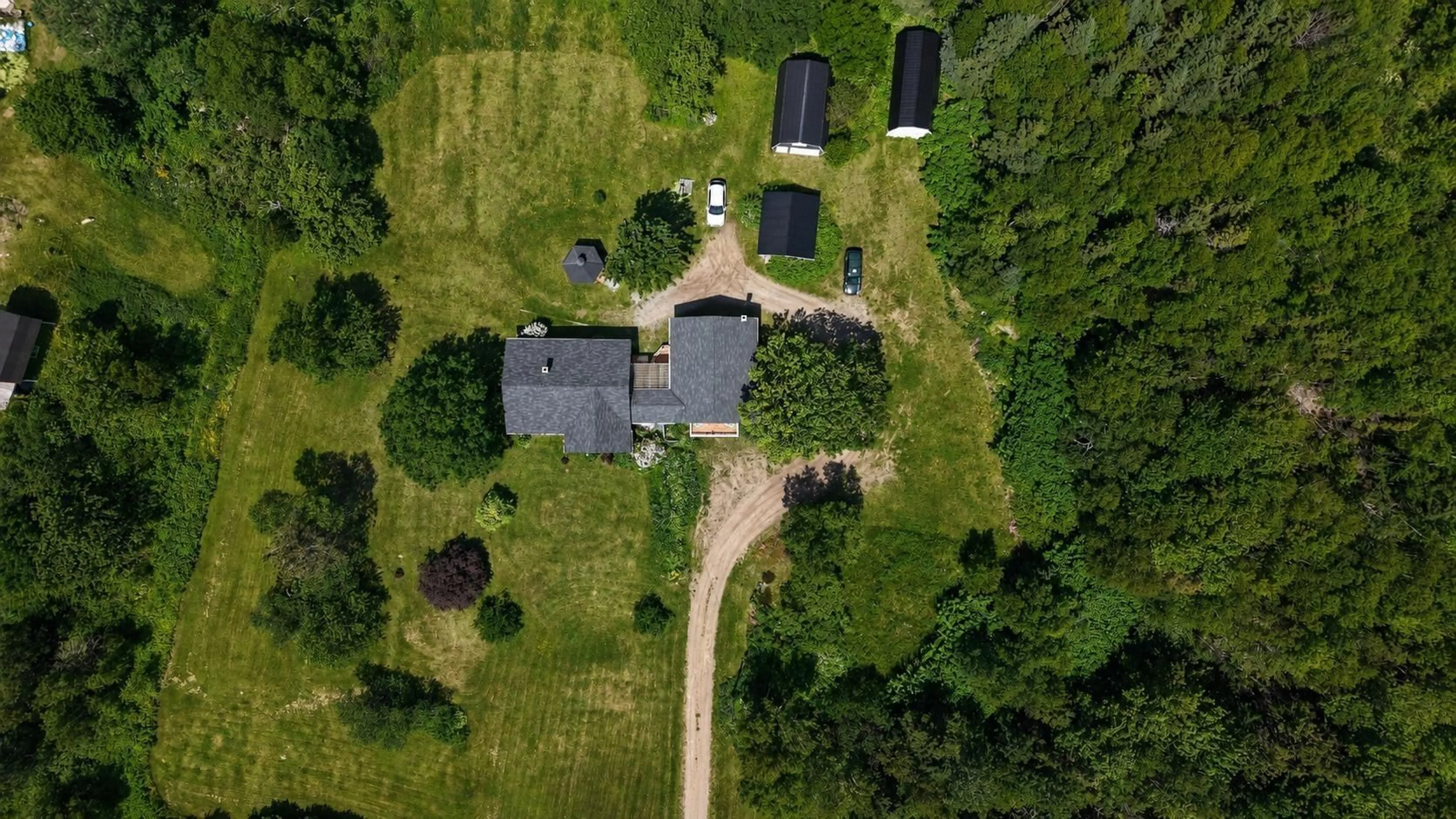 A pic from outside/outdoor area/front of a property/back of a property/a pic from drone, unknown for 29389 Cabot Trail, Cape North Nova Scotia B0C 1G0