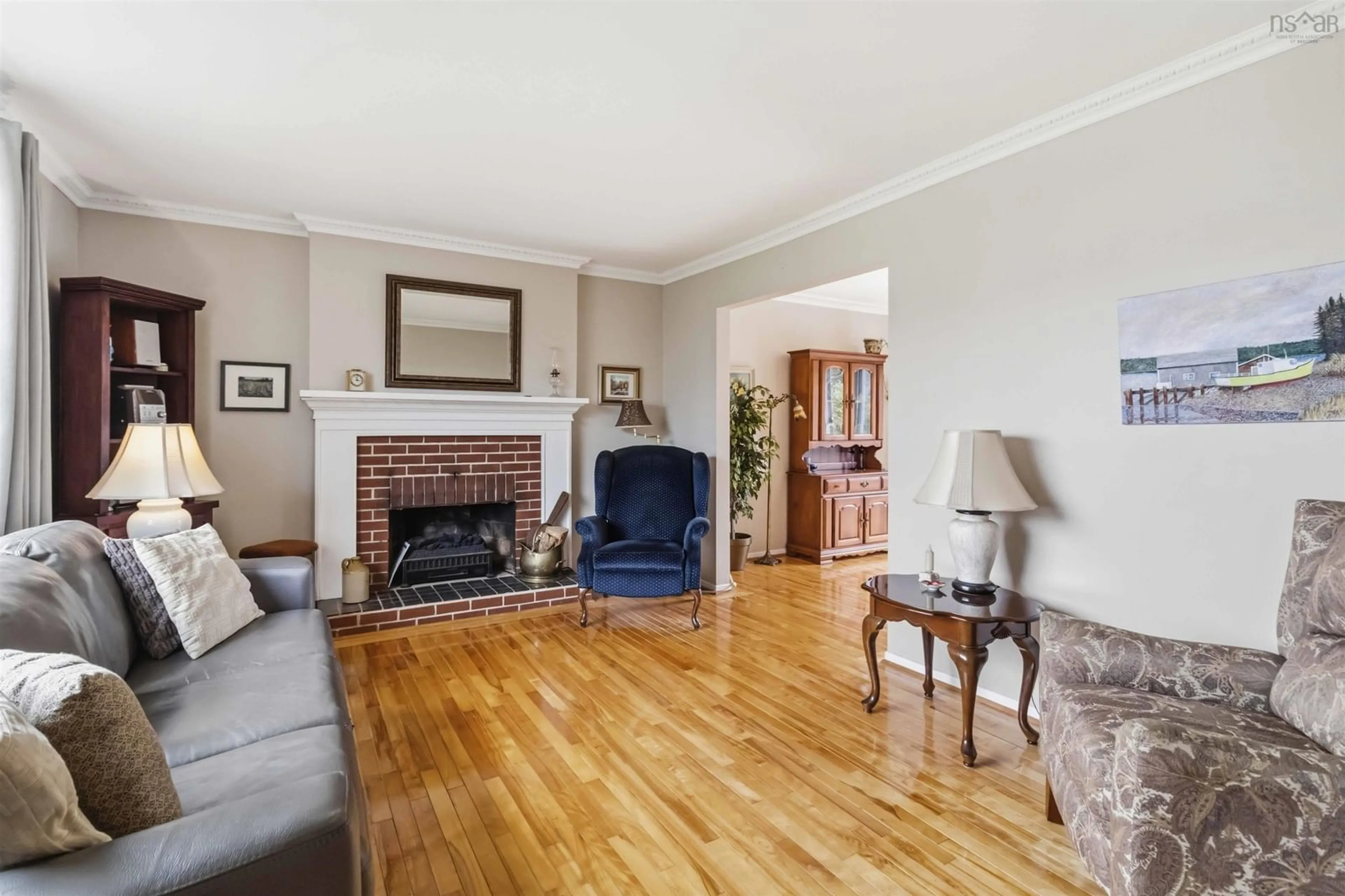 Living room with furniture, wood/laminate floor for 12 Briarlynn Cres, Cole Harbour Nova Scotia B2V 1K6
