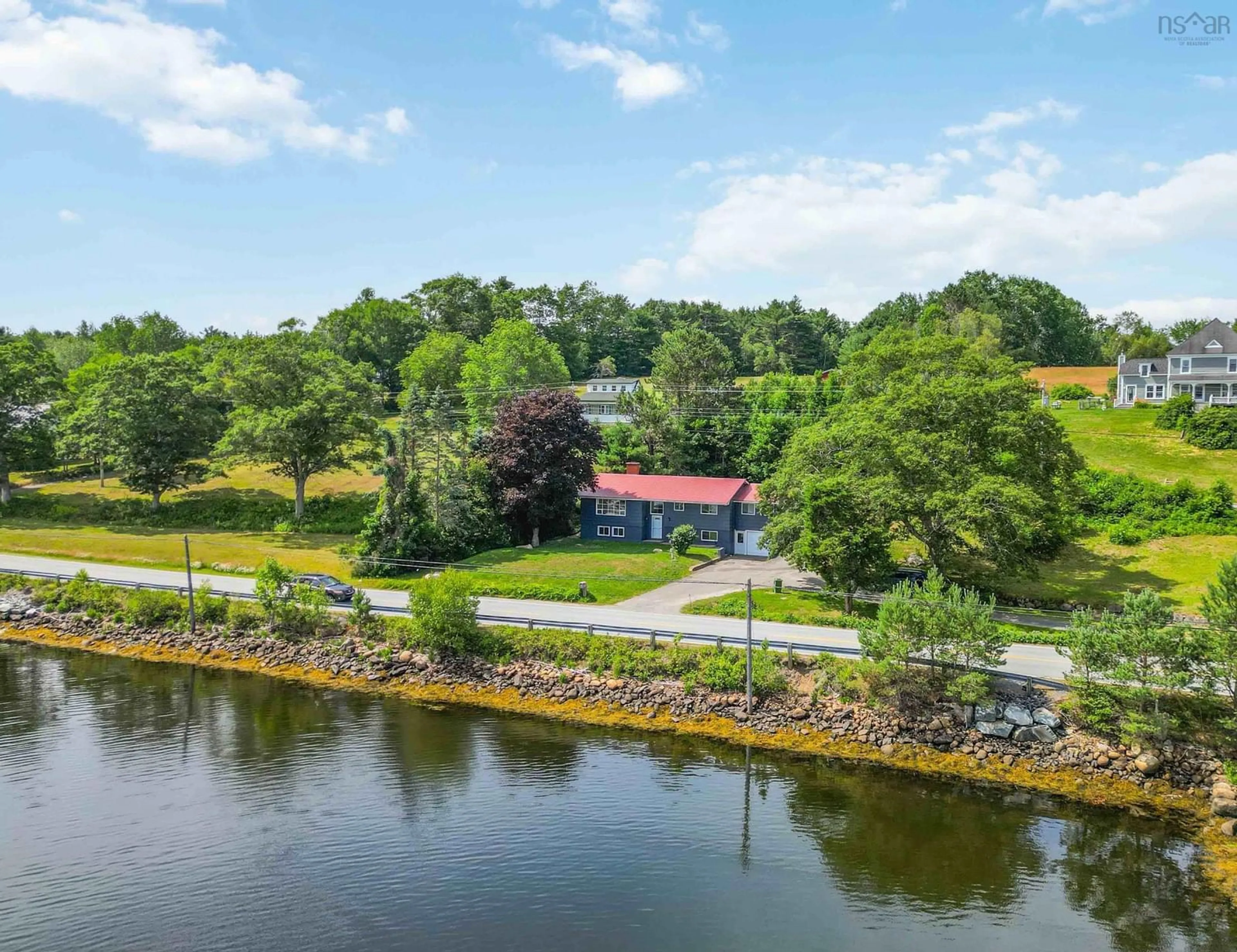 A pic from outside/outdoor area/front of a property/back of a property/a pic from drone, water/lake/river/ocean view for 1868 Highway 331, West Lahave Nova Scotia B0R 1G0