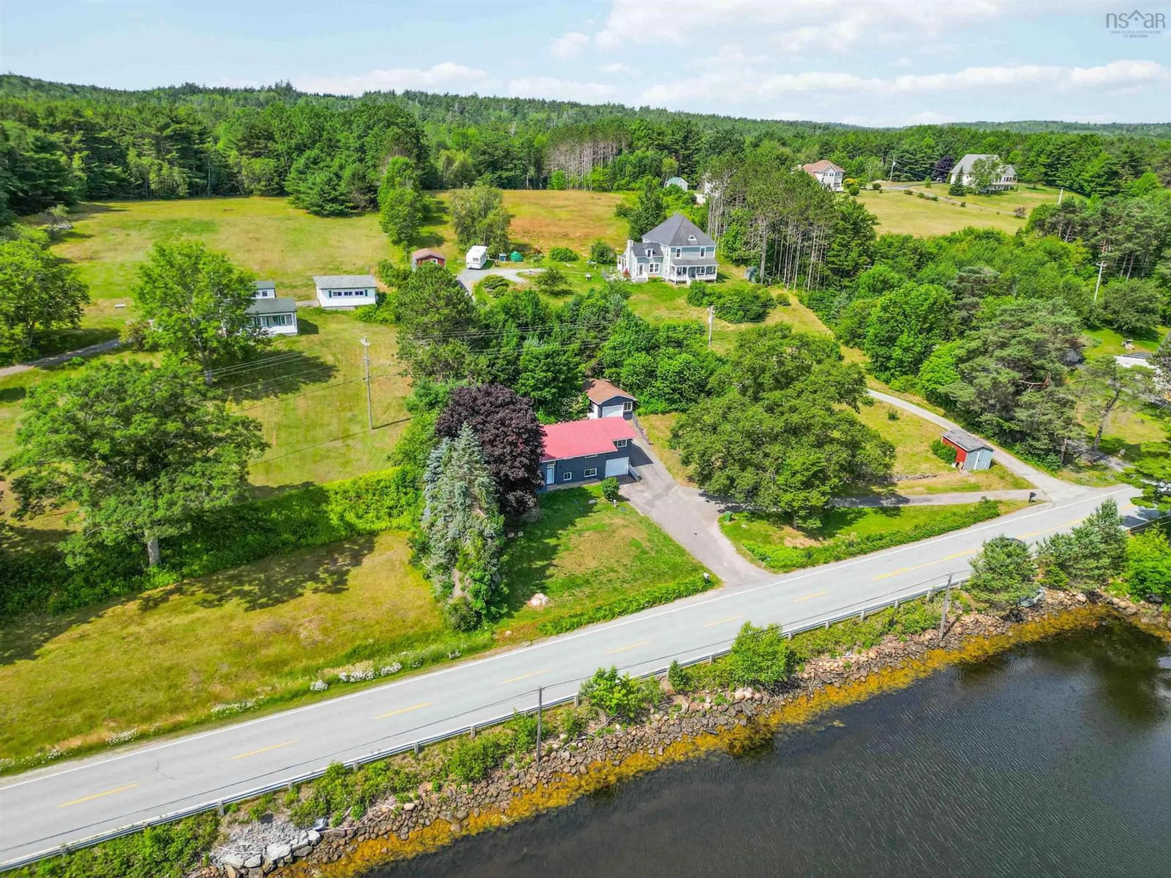 A pic from outside/outdoor area/front of a property/back of a property/a pic from drone, water/lake/river/ocean view for 1868 Highway 331, West Lahave Nova Scotia B0R 1G0