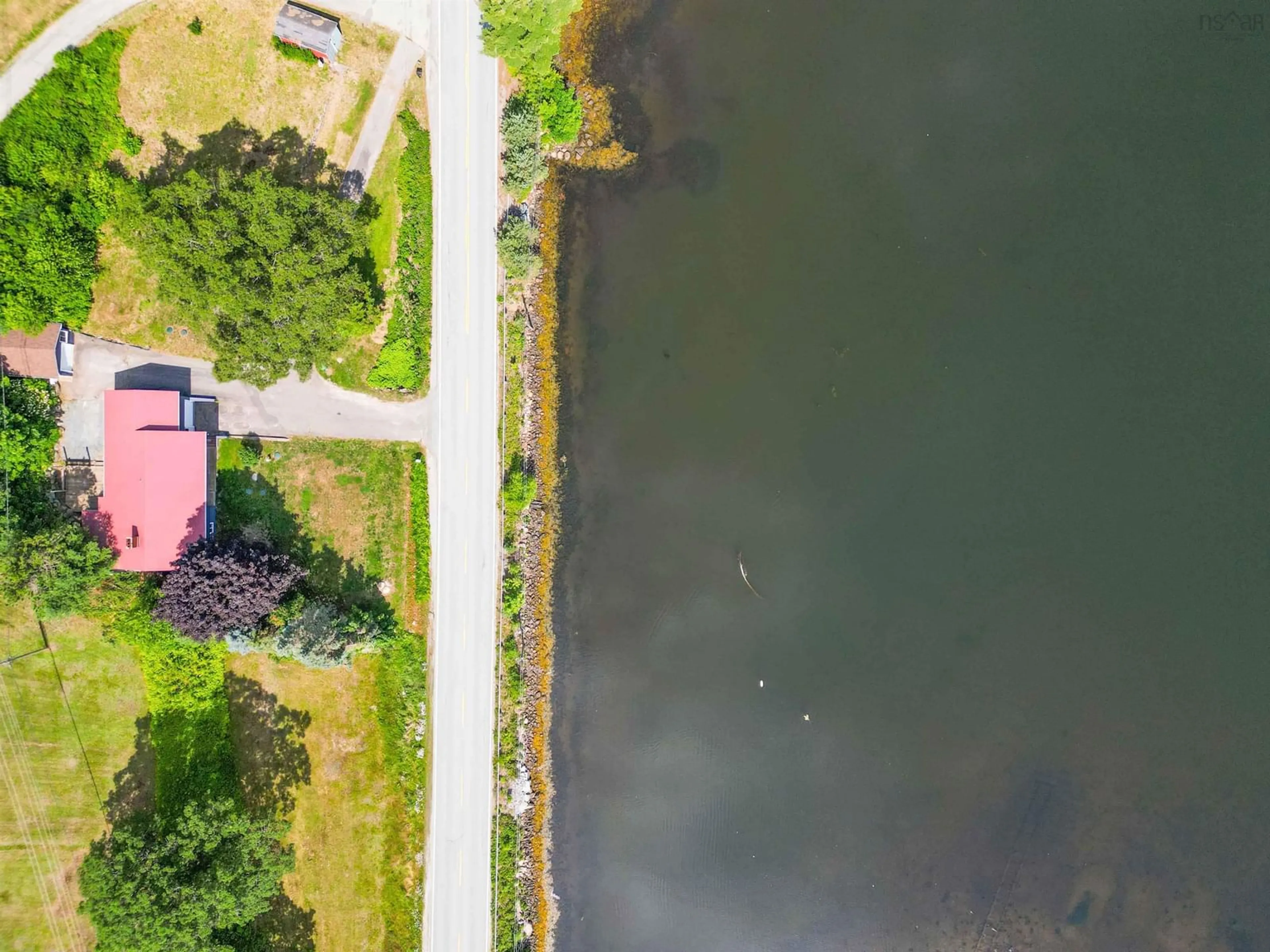 A pic from outside/outdoor area/front of a property/back of a property/a pic from drone, water/lake/river/ocean view for 1868 Highway 331, West Lahave Nova Scotia B0R 1G0