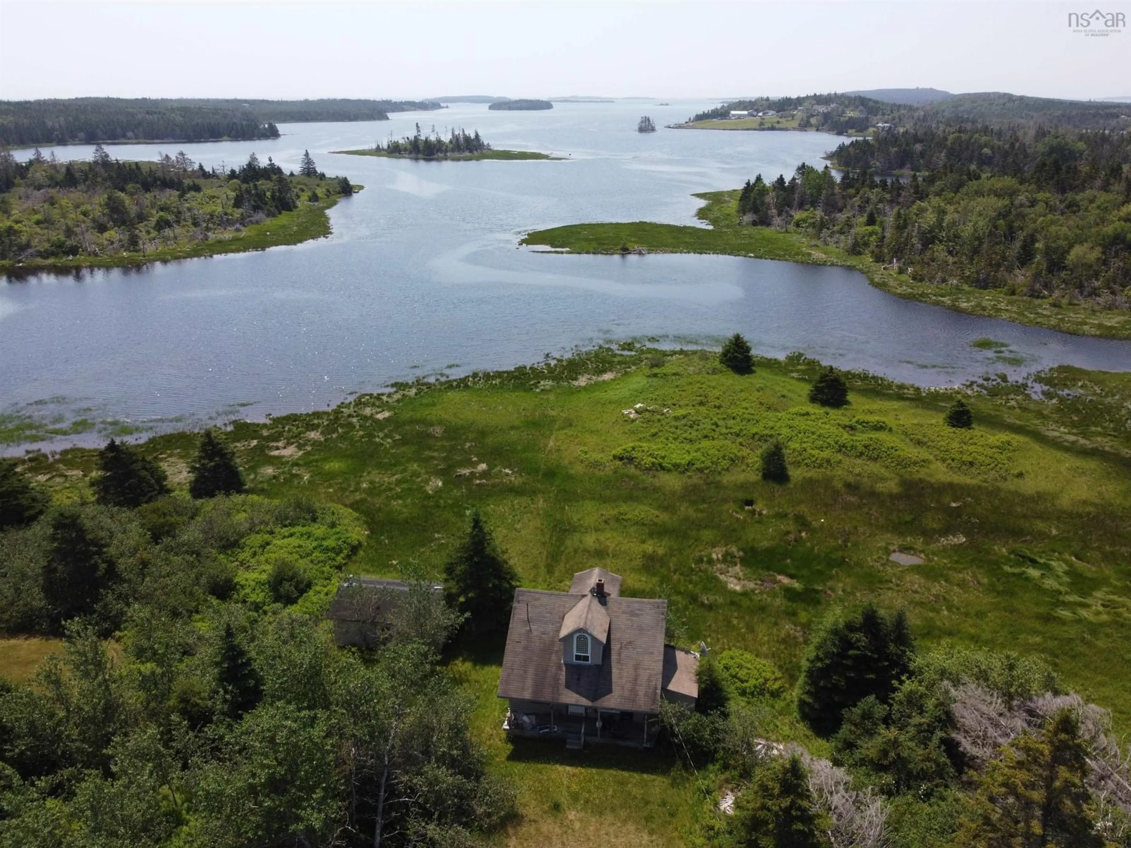 A pic from outside/outdoor area/front of a property/back of a property/a pic from drone, water/lake/river/ocean view for 26346 Highway 7, West Quoddy Nova Scotia B0J 2R0