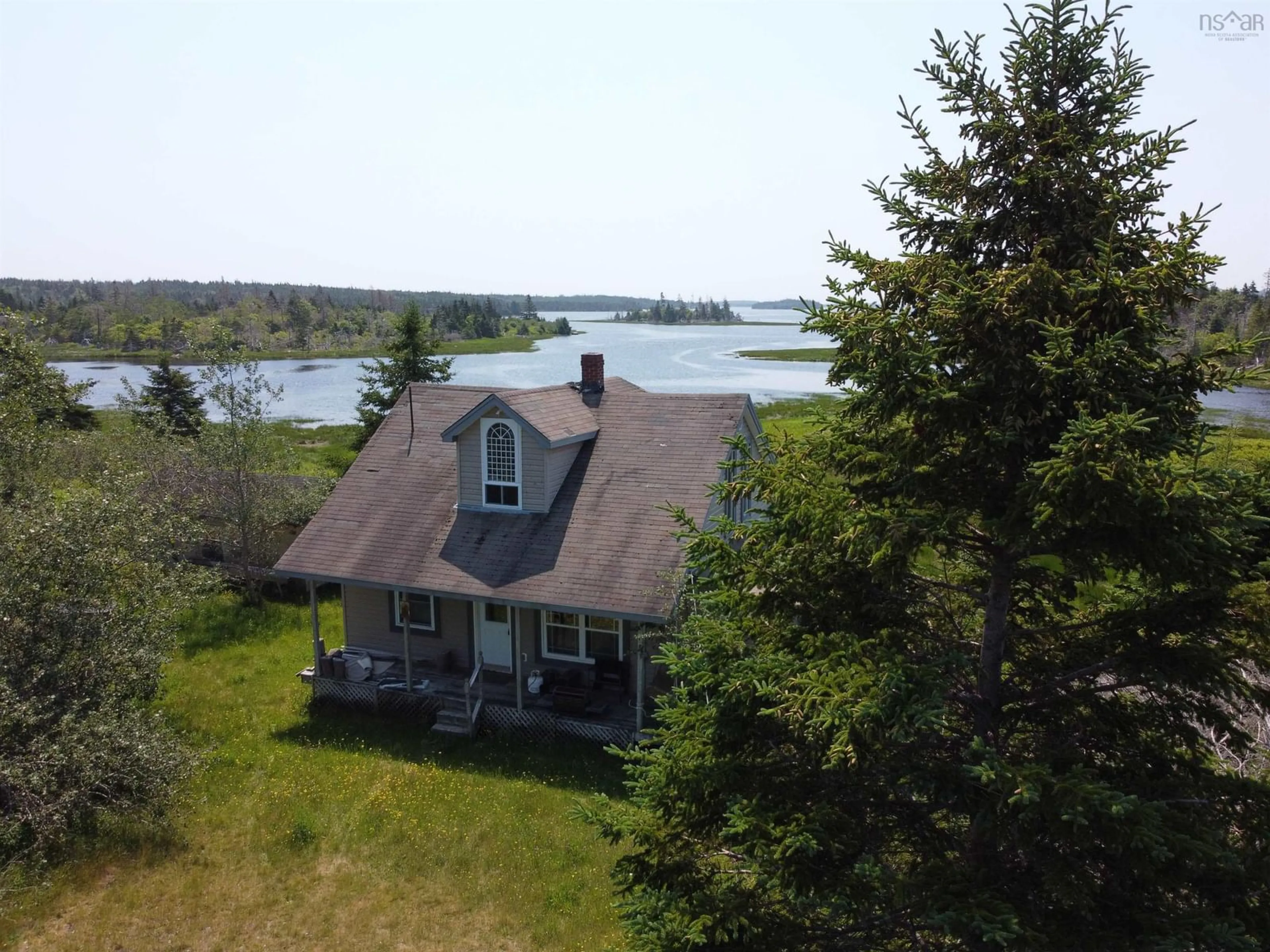 A pic from outside/outdoor area/front of a property/back of a property/a pic from drone, water/lake/river/ocean view for 26346 Highway 7, West Quoddy Nova Scotia B0J 2R0