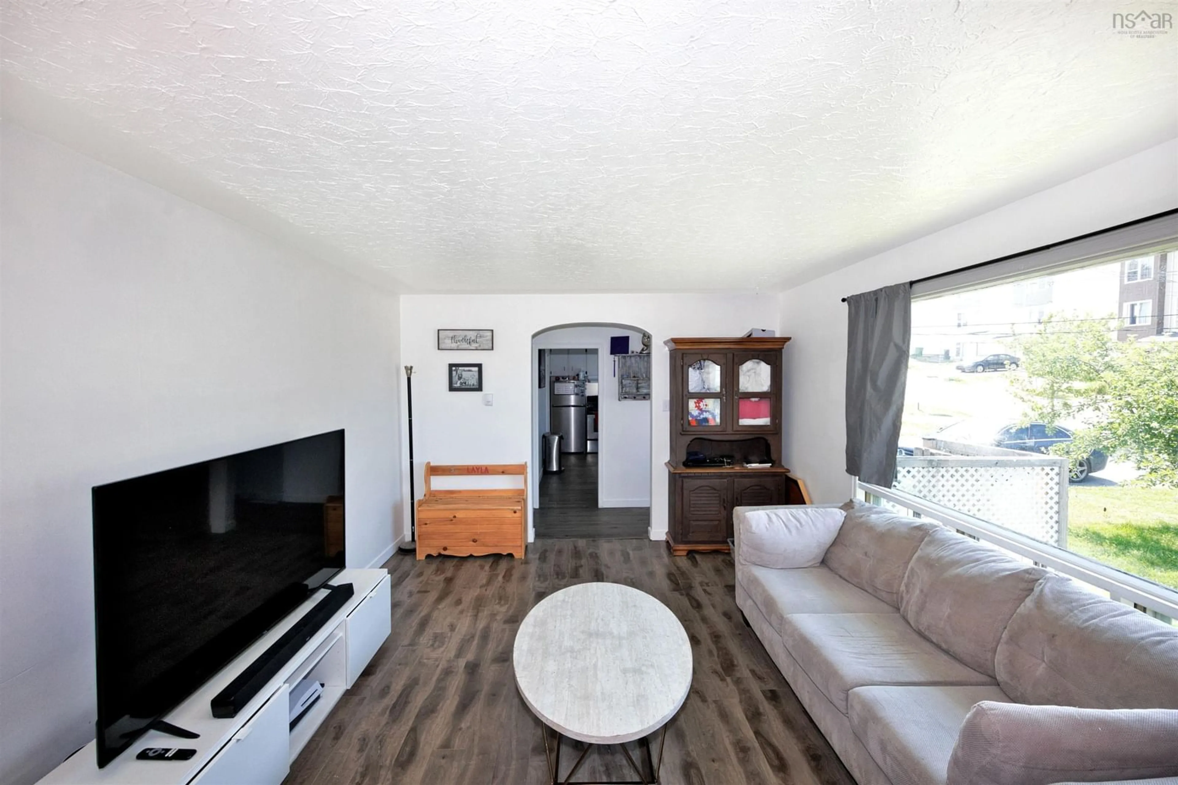 Living room with furniture, wood/laminate floor for 34 Hilden Dr, Halifax Nova Scotia B3R 1K2