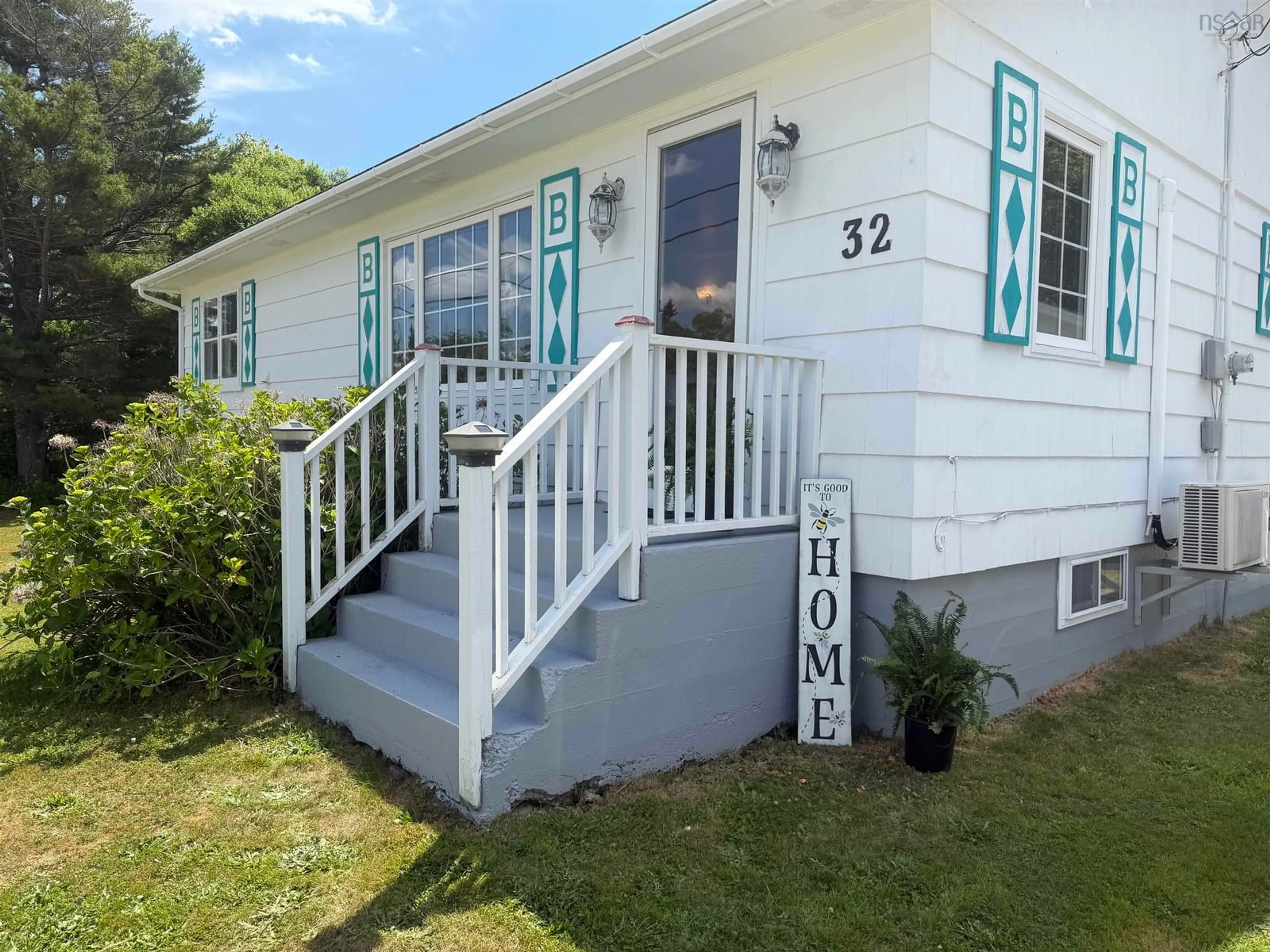 Home with vinyl exterior material, street for 32 New Rd, Lower Wedgeport Nova Scotia B0W 2B0