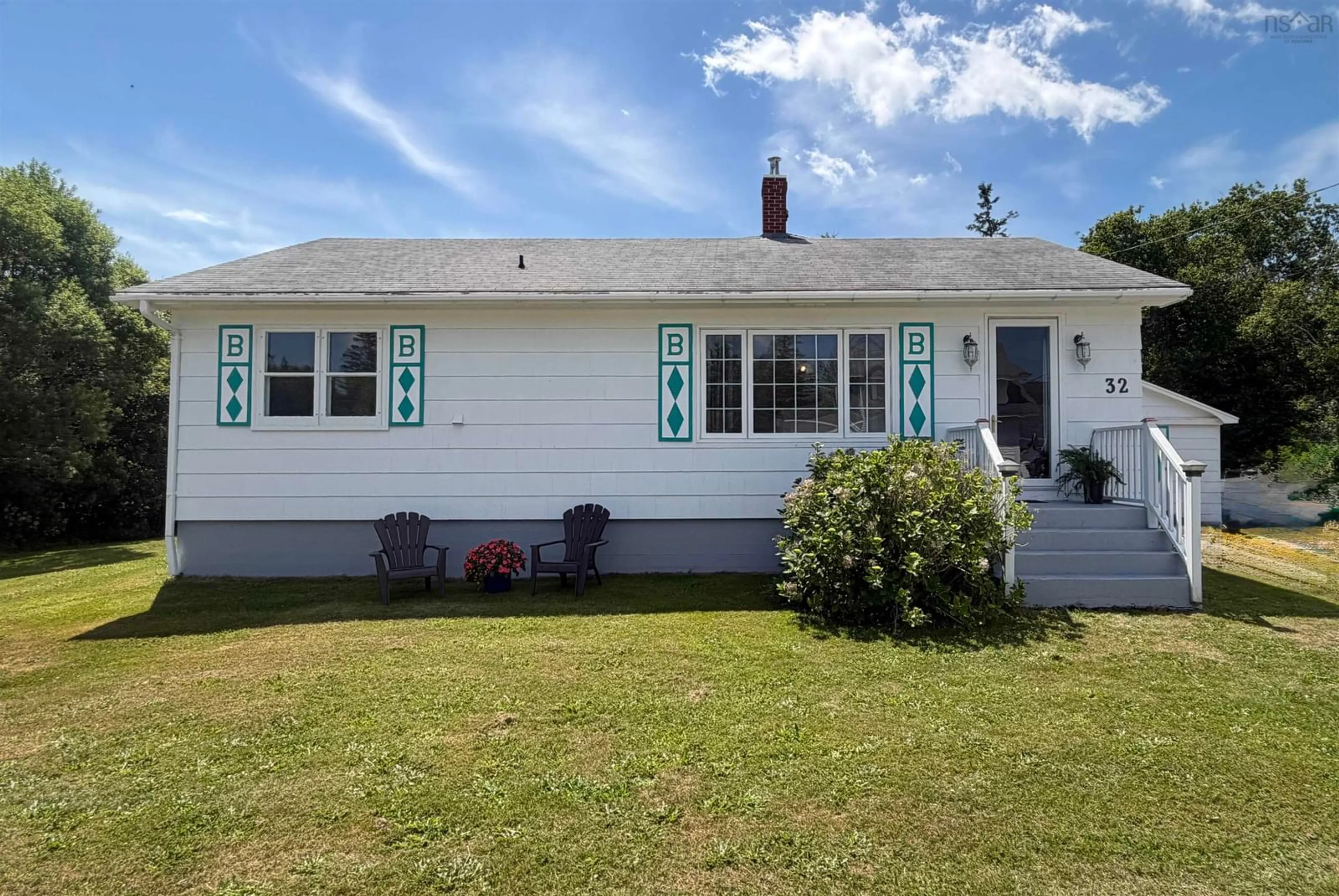 Home with vinyl exterior material, street for 32 New Rd, Lower Wedgeport Nova Scotia B0W 2B0