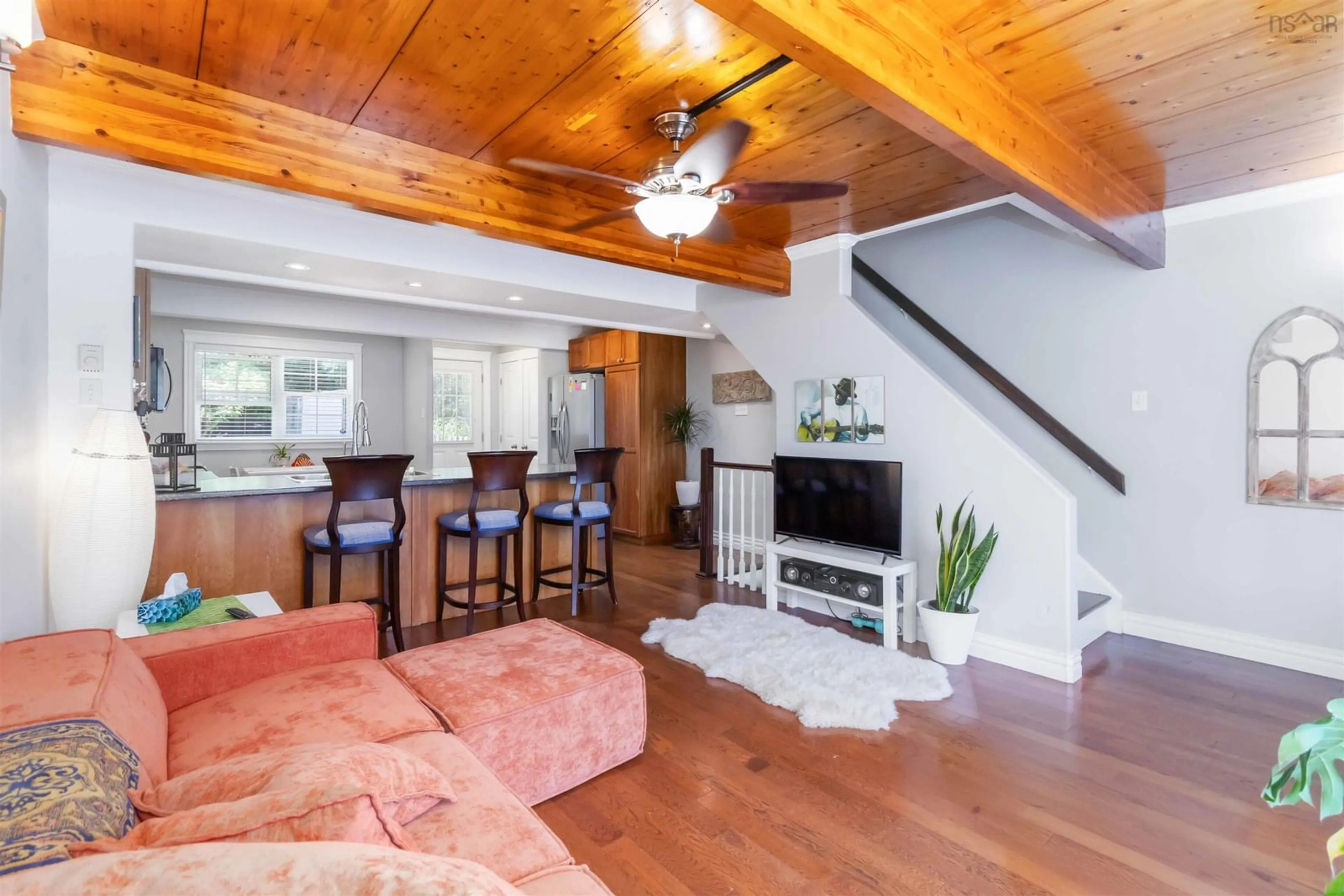 Living room with furniture, wood/laminate floor for 43 Shepherd Rd #27, Cowie Hill Nova Scotia B3P 2K6