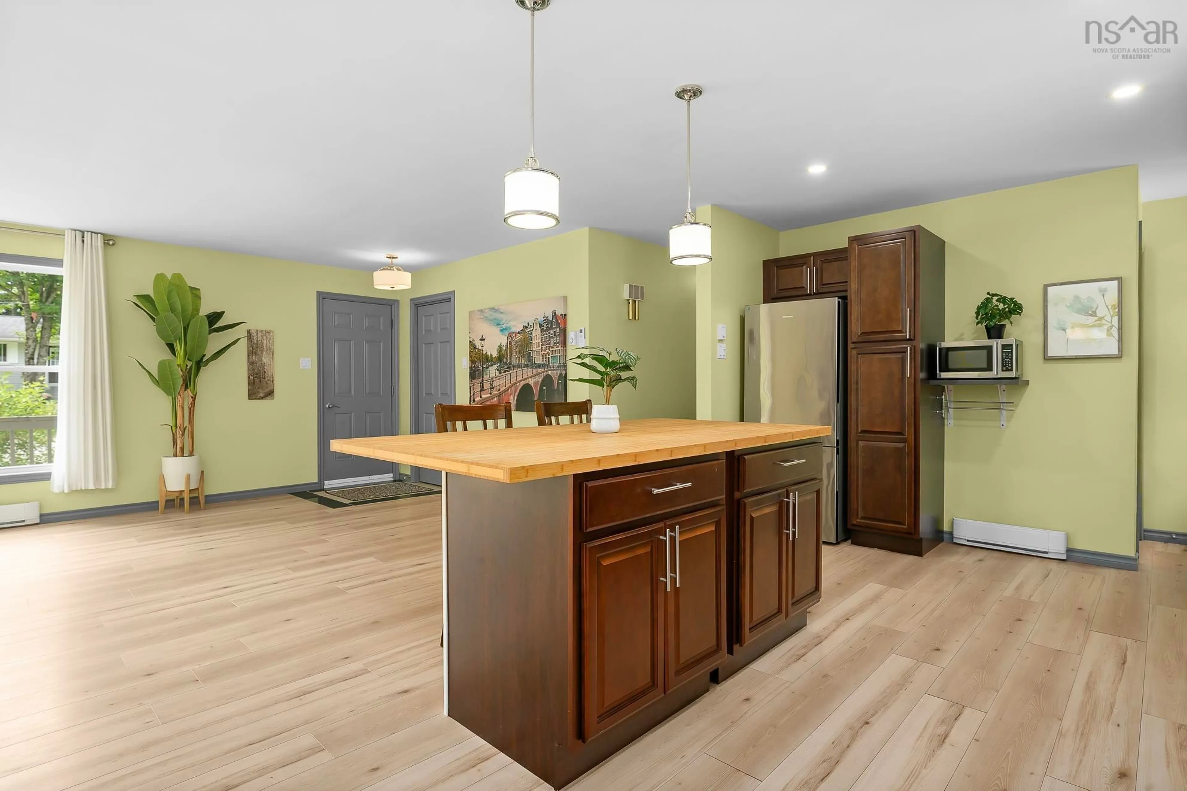 Open concept kitchen, wood/laminate floor for 87 Marlboro Dr, Bridgewater Nova Scotia B4V 2Y1