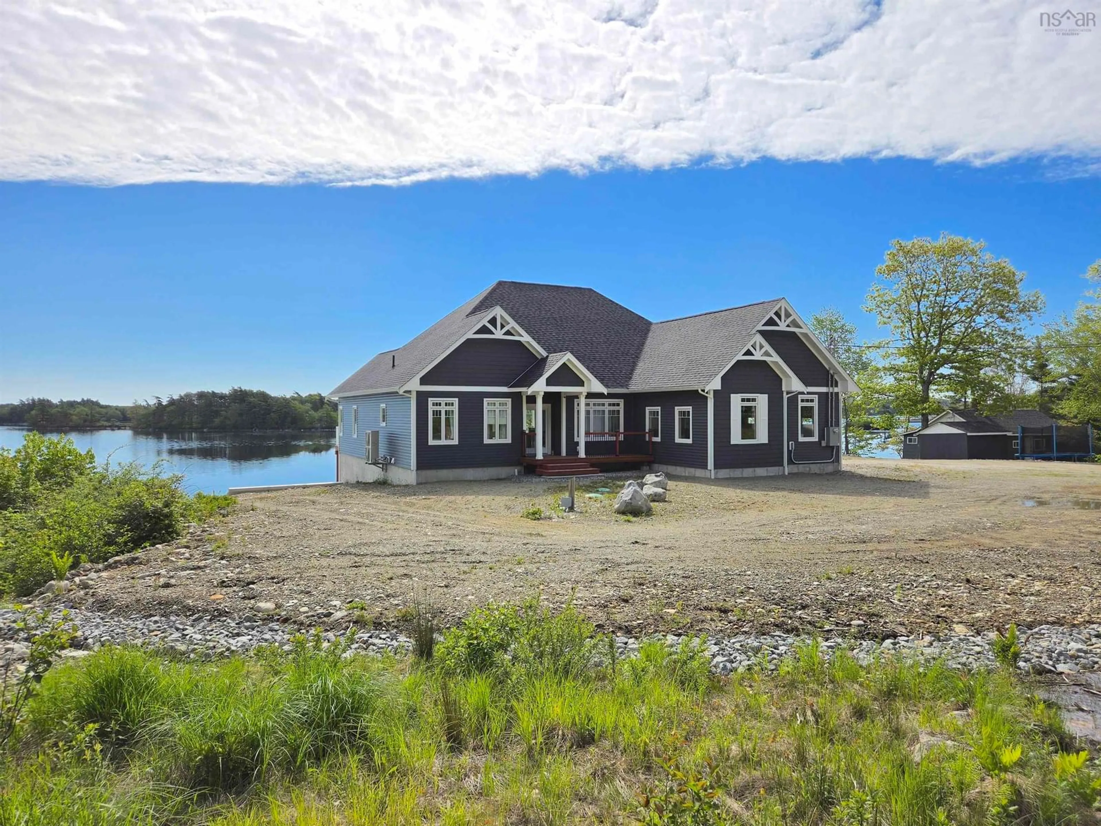 A pic from outside/outdoor area/front of a property/back of a property/a pic from drone, water/lake/river/ocean view for 3224 203 Hwy, Middle Ohio Nova Scotia B0T 1W0