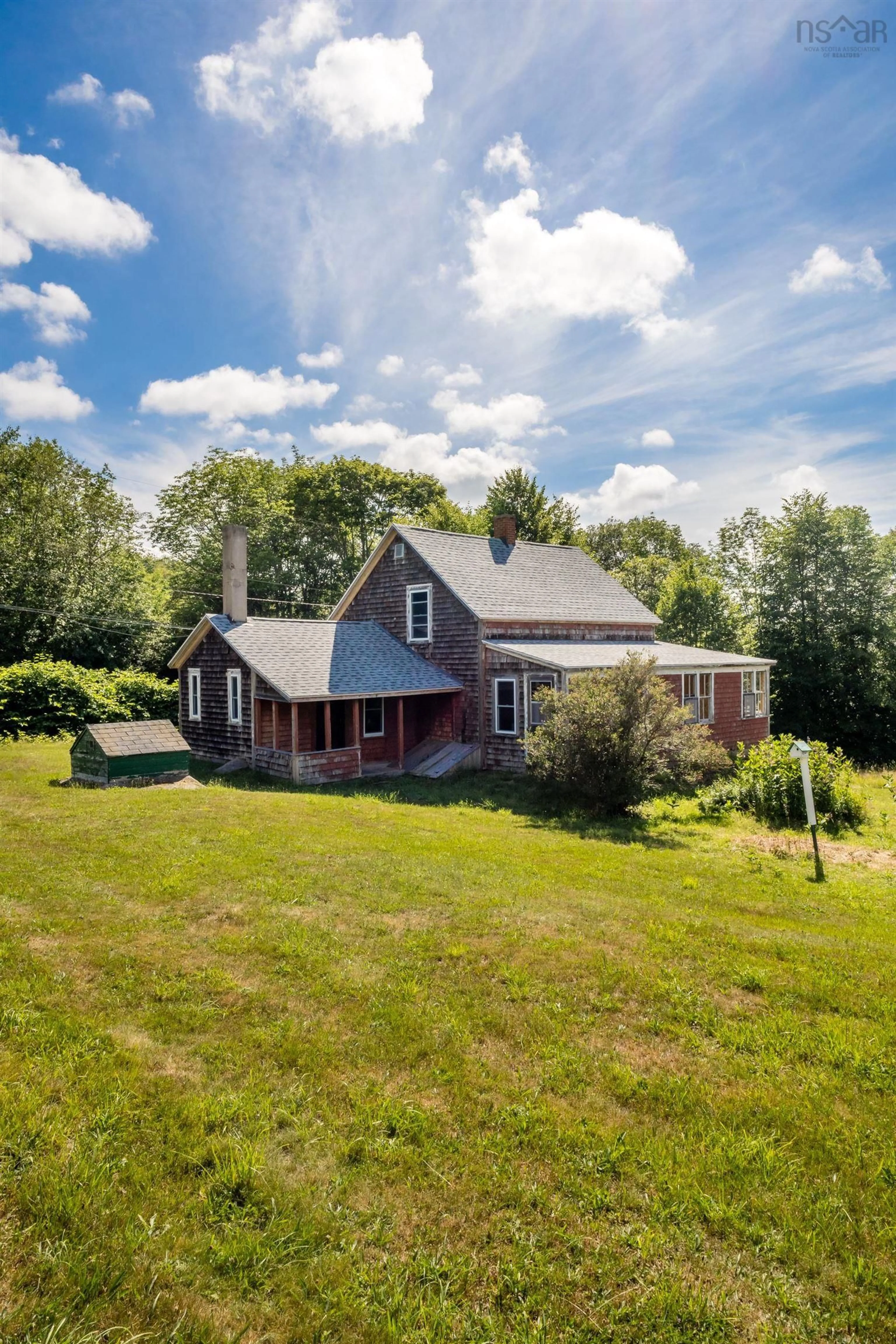 A pic from outside/outdoor area/front of a property/back of a property/a pic from drone, building for 134 Pecks Hill Rd, Bear River Nova Scotia B0S 1B0