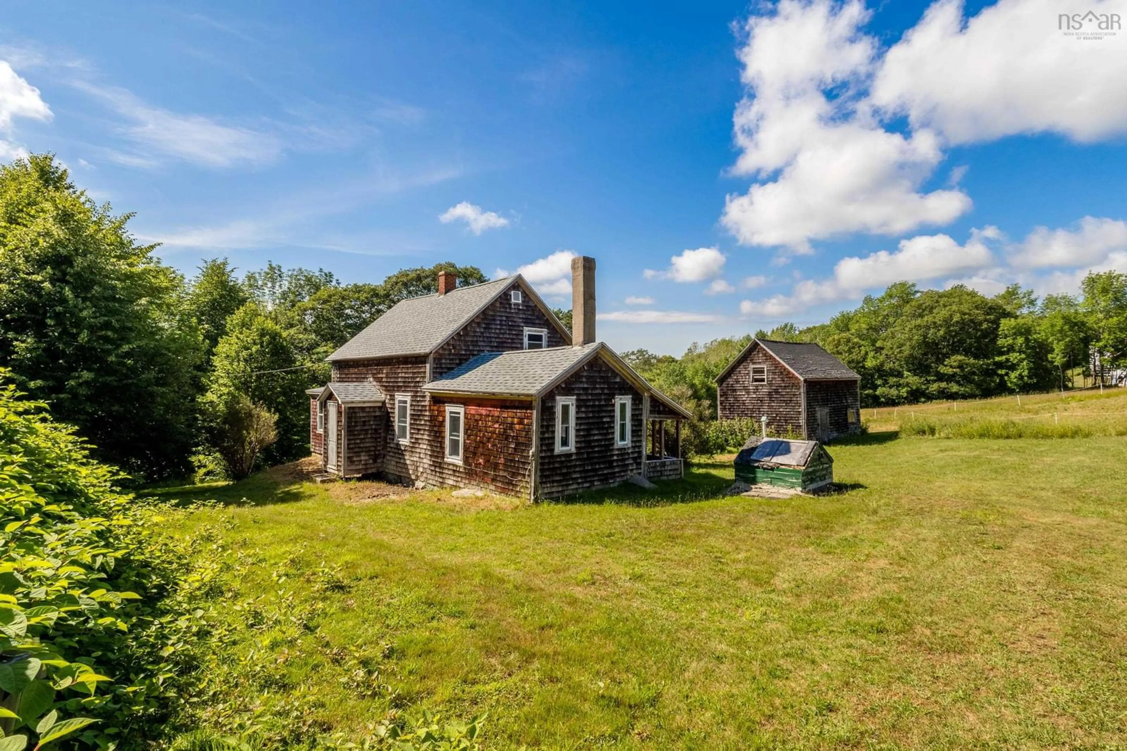 A pic from outside/outdoor area/front of a property/back of a property/a pic from drone, building for 134 Pecks Hill Rd, Bear River Nova Scotia B0S 1B0