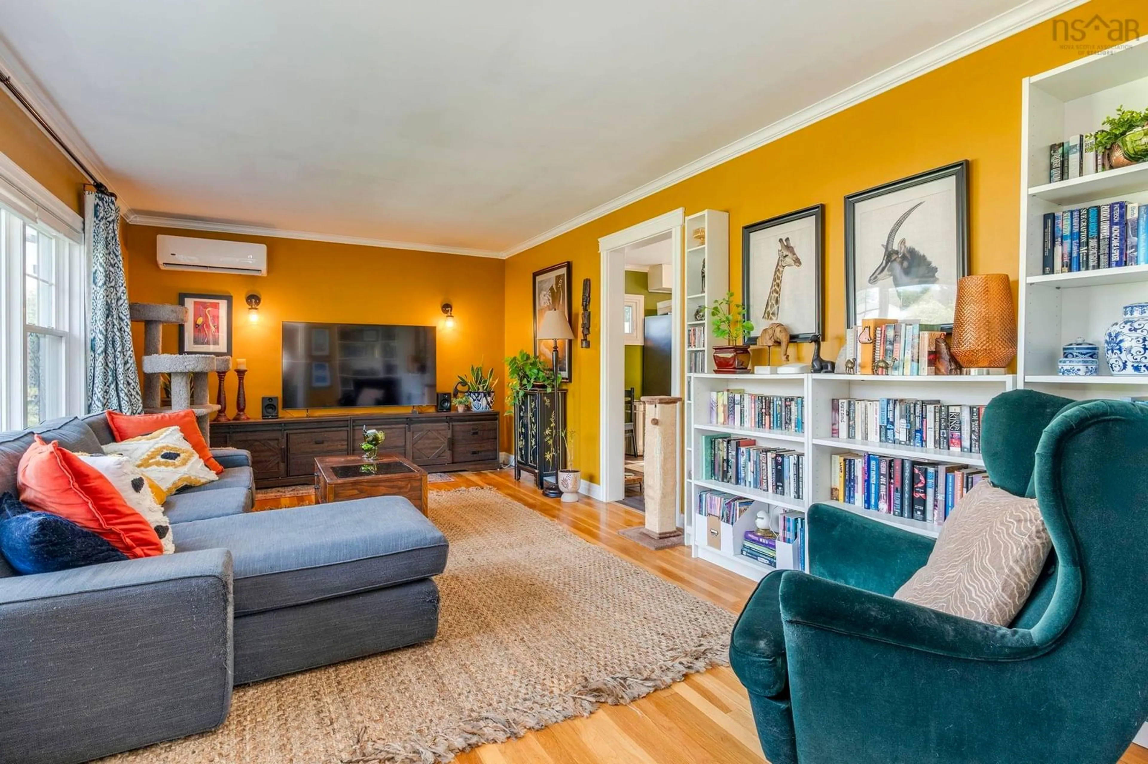 Living room with furniture, wood/laminate floor for 7 Edmond Dr, Woodlawn Nova Scotia B2W 2K1