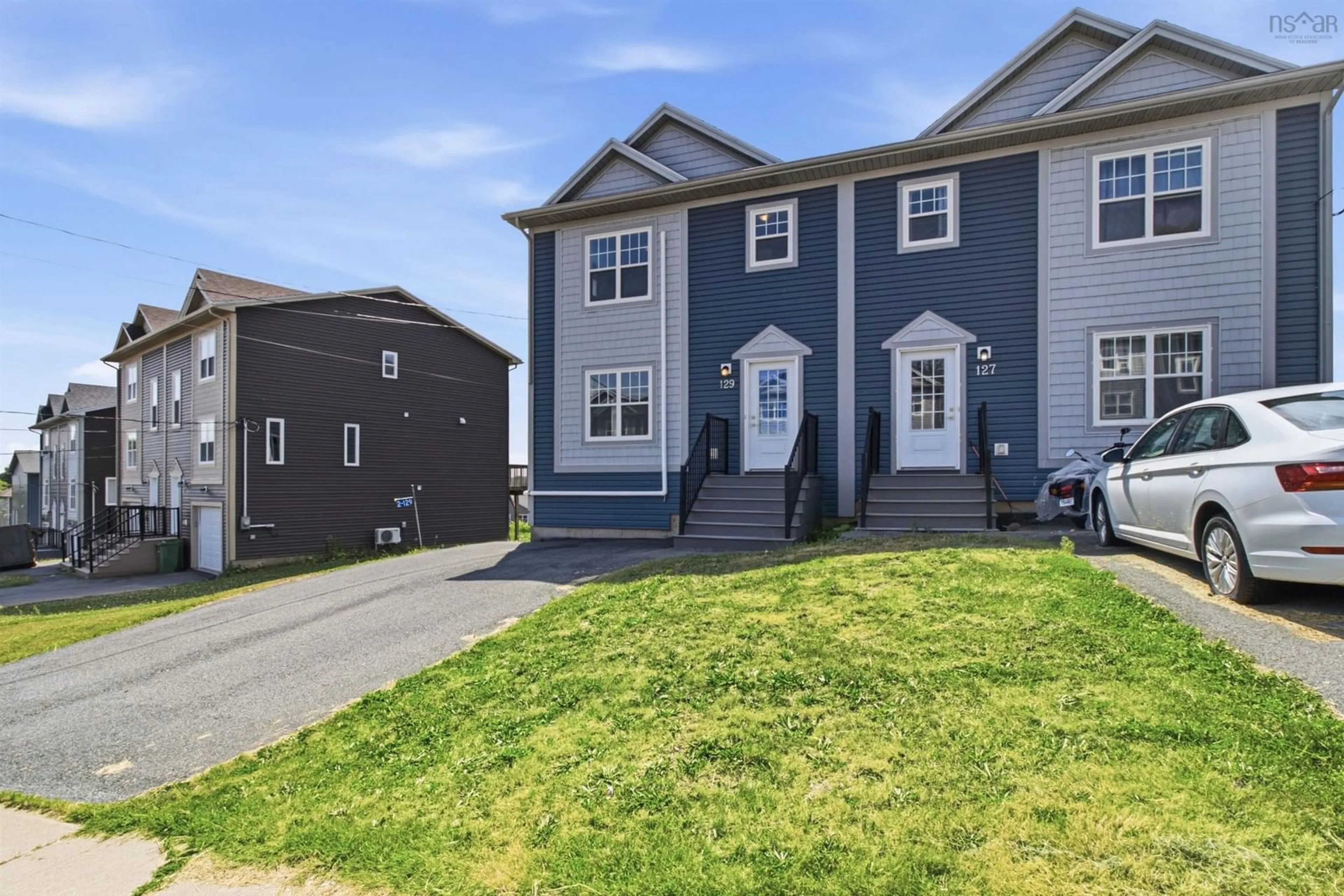 Home with vinyl exterior material, street for 129 Executive Dr, Middle Sackville Nova Scotia B4E 3A7