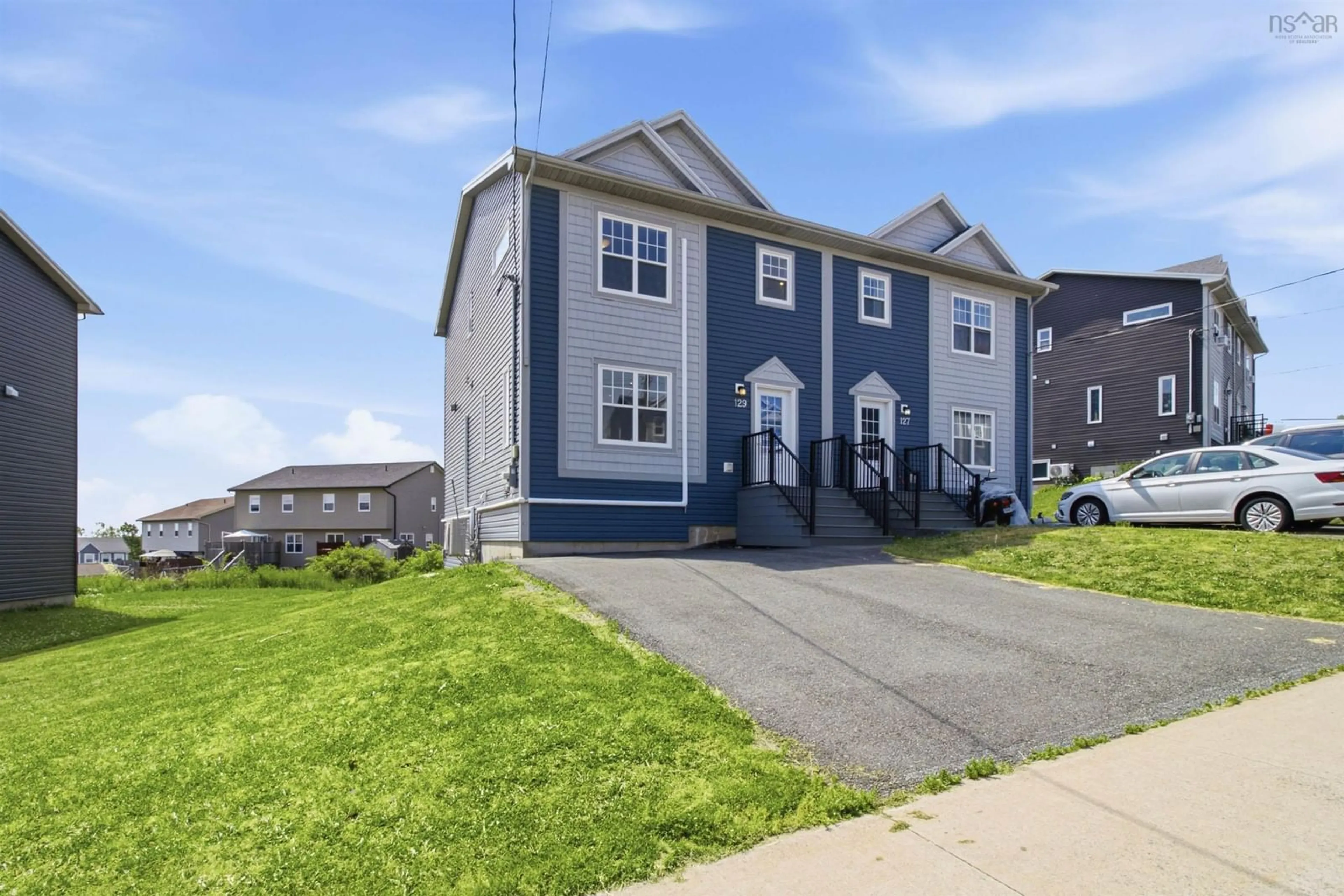 Home with vinyl exterior material, street for 129 Executive Dr, Middle Sackville Nova Scotia B4E 3A7