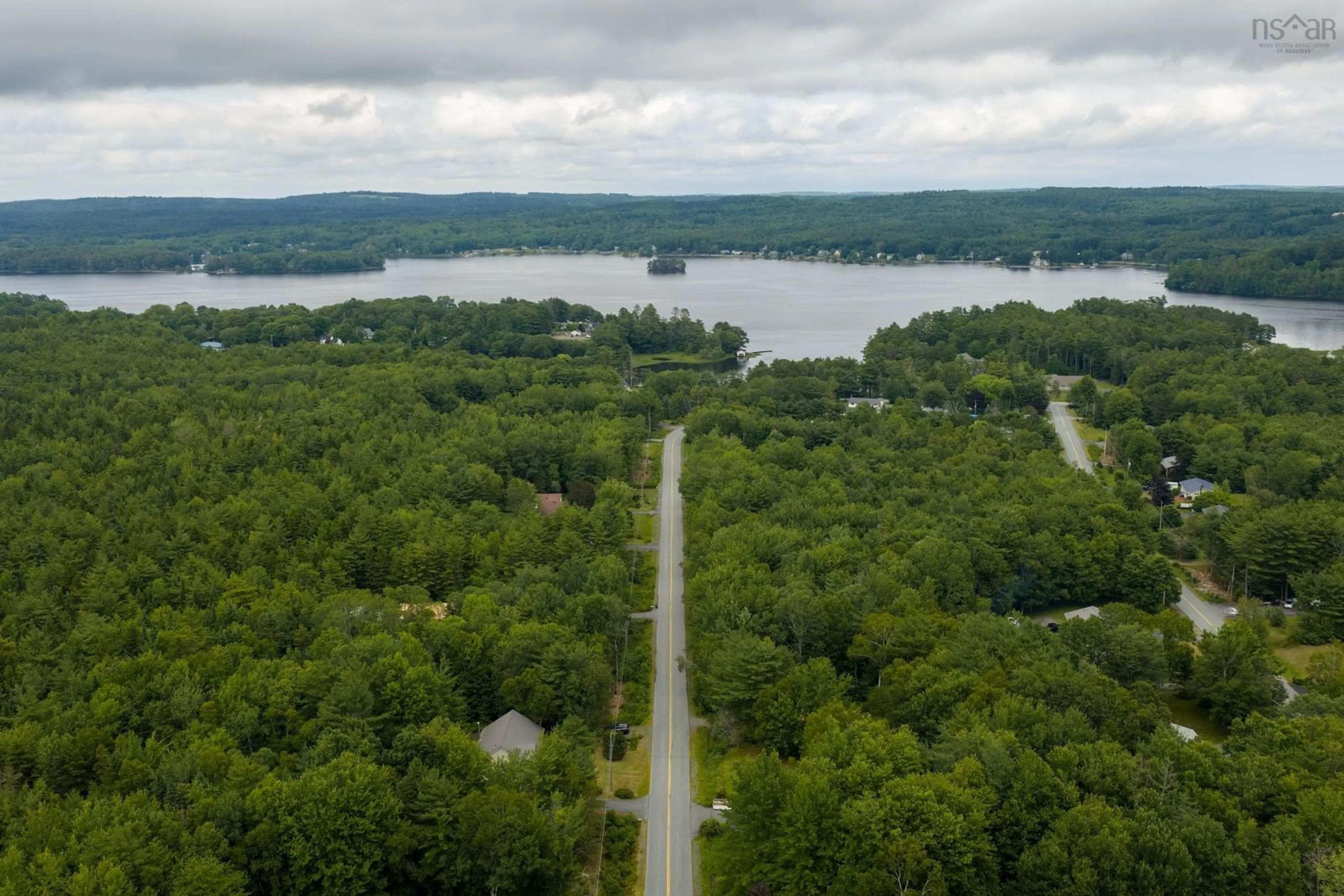 A pic from outside/outdoor area/front of a property/back of a property/a pic from drone, water/lake/river/ocean view for 104 Bluenose Ave, Pleasantville Nova Scotia B0R 1G0