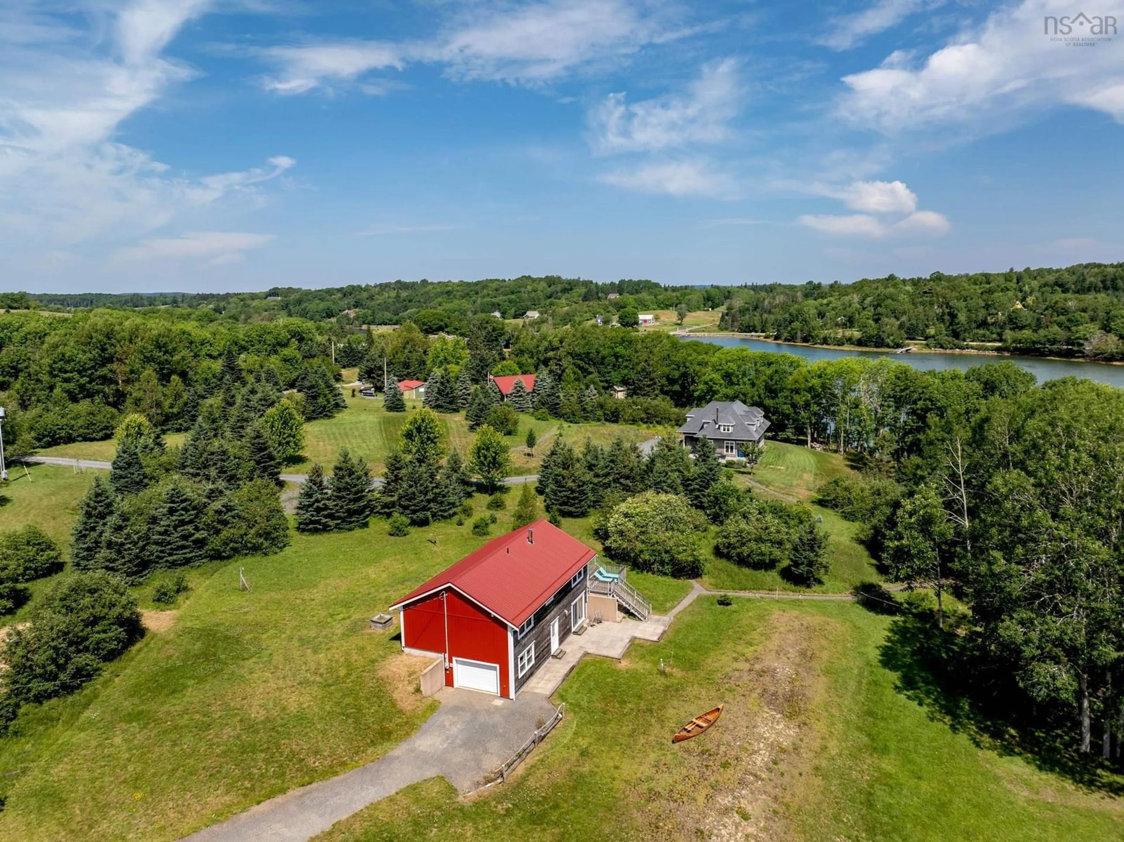 A pic from outside/outdoor area/front of a property/back of a property/a pic from drone, water/lake/river/ocean view for 9 Littlecove Rd, First Peninsula Nova Scotia B0J 2C0