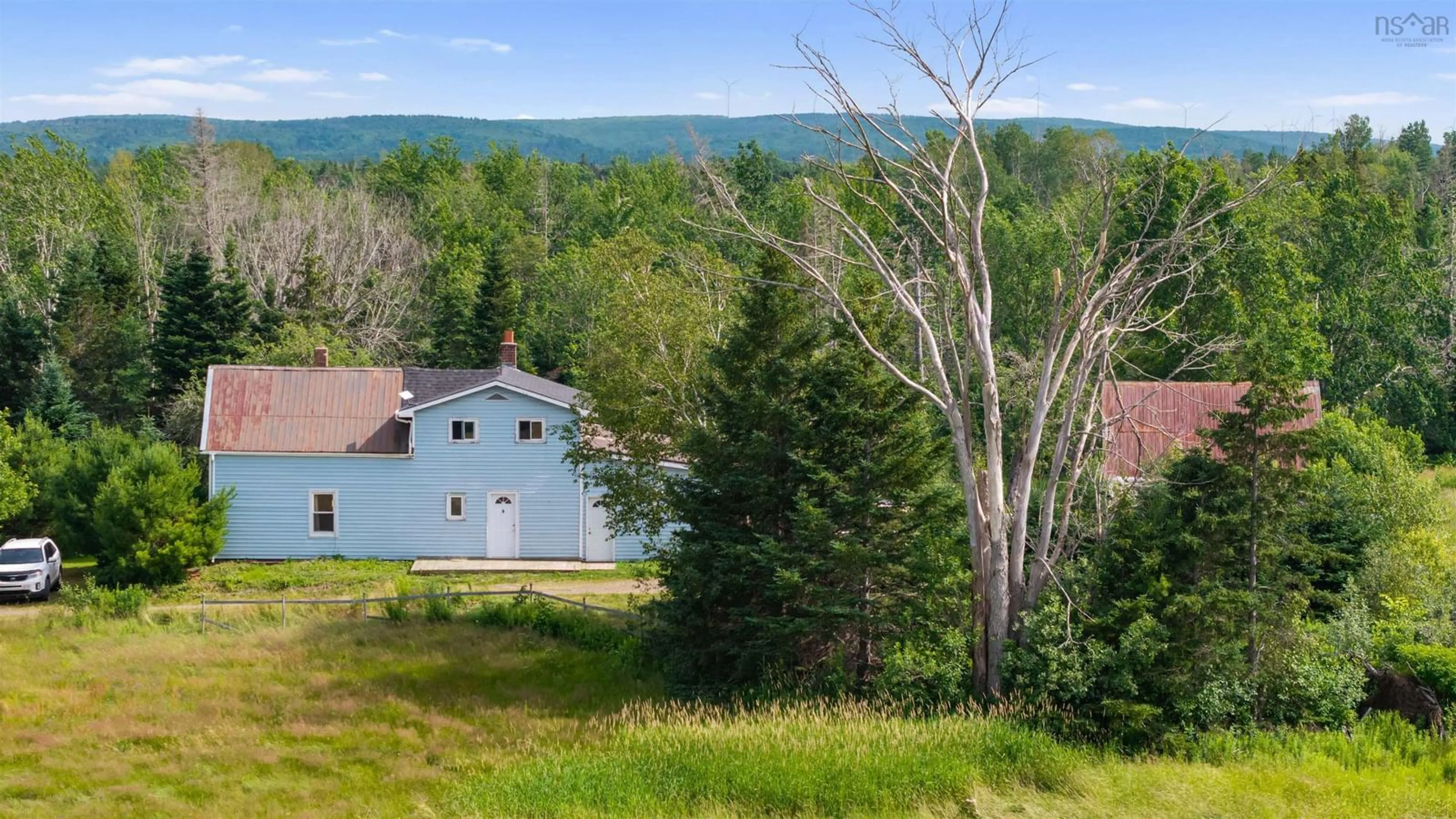 A pic from outside/outdoor area/front of a property/back of a property/a pic from drone, water/lake/river/ocean view for 111 Minto Rd, Black River Nova Scotia B0K 1R0