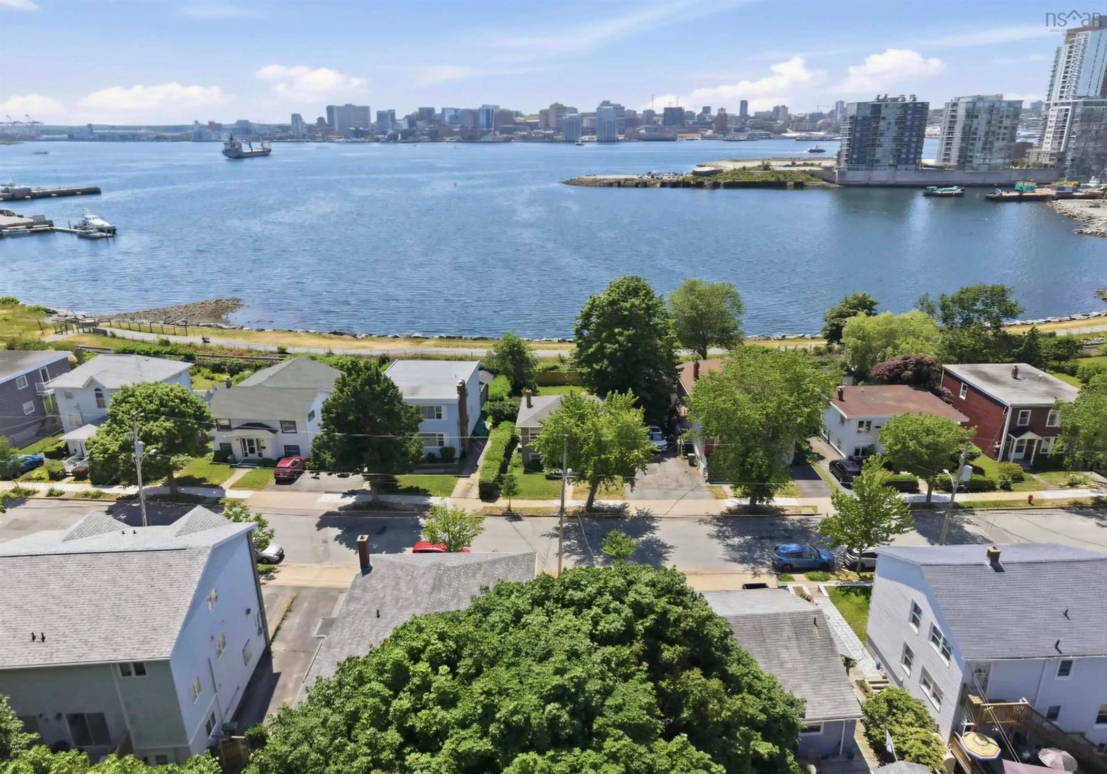 A pic from outside/outdoor area/front of a property/back of a property/a pic from drone, water/lake/river/ocean view for 56 Hazelhurst St, Dartmouth Nova Scotia B2Y 3N2
