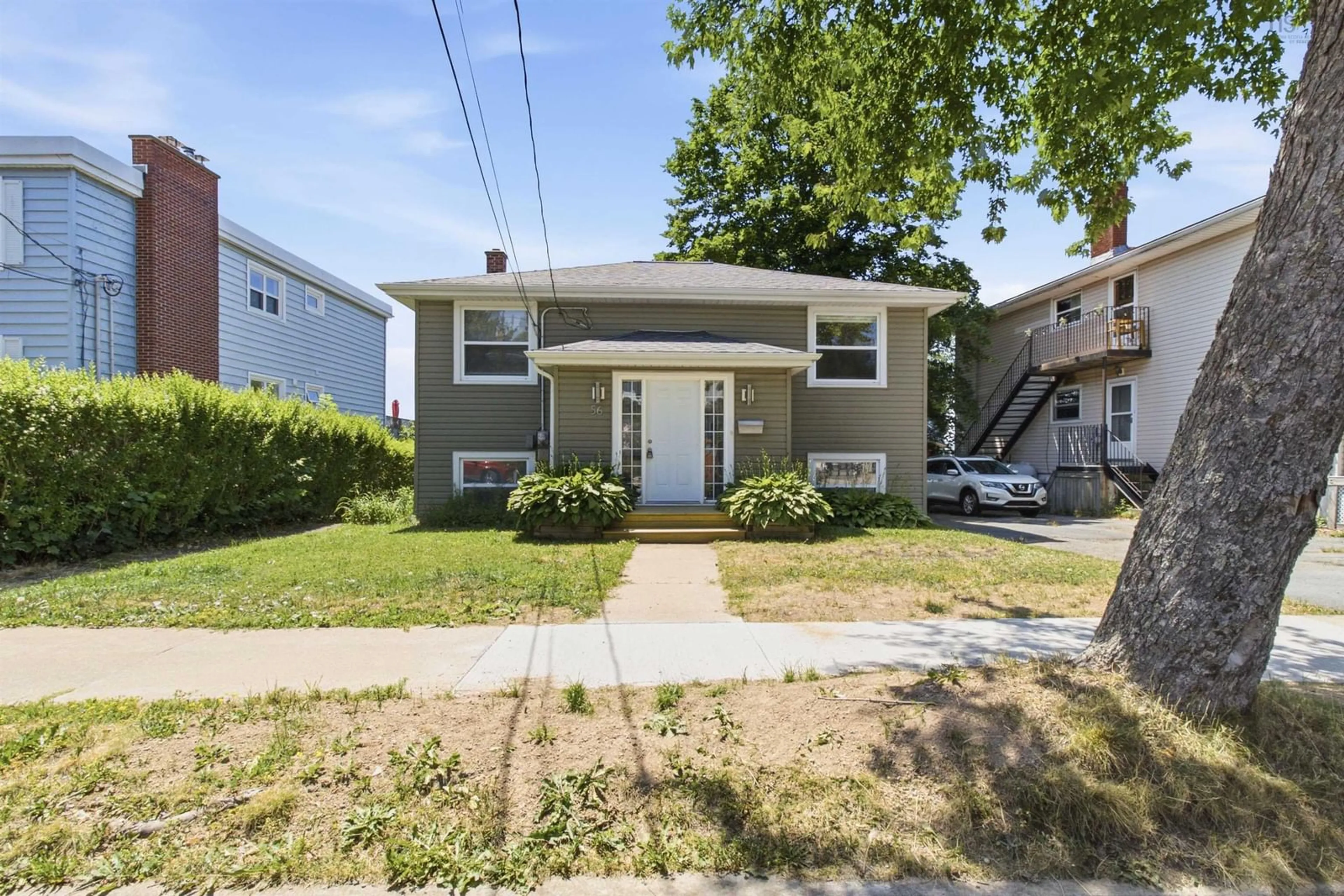Home with vinyl exterior material, street for 56 Hazelhurst St, Dartmouth Nova Scotia B2Y 3N2