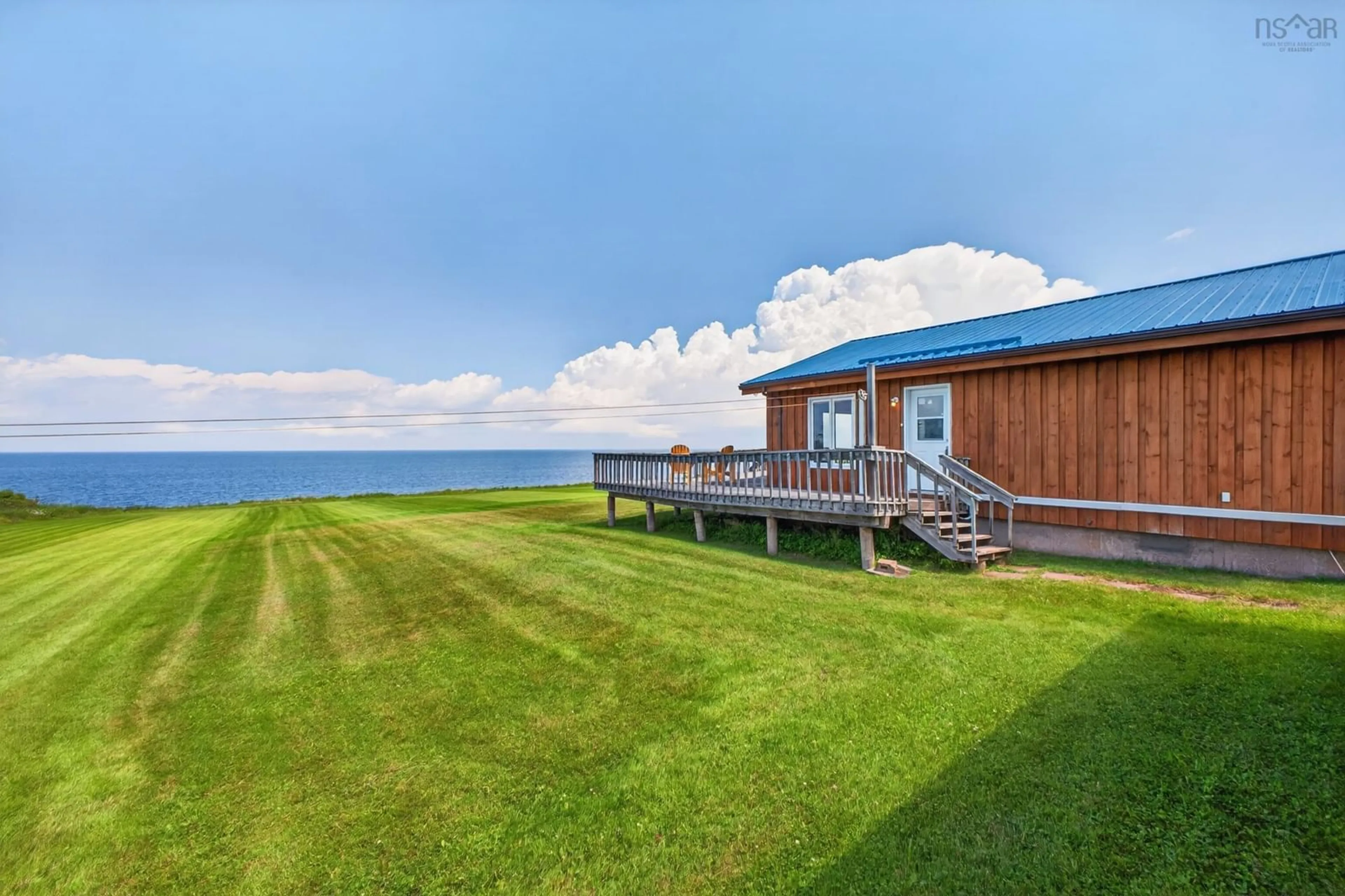 A pic from outside/outdoor area/front of a property/back of a property/a pic from drone, water/lake/river/ocean view for 74 Apple Cross Rd, Gulf Shore Nova Scotia B0K 1L0