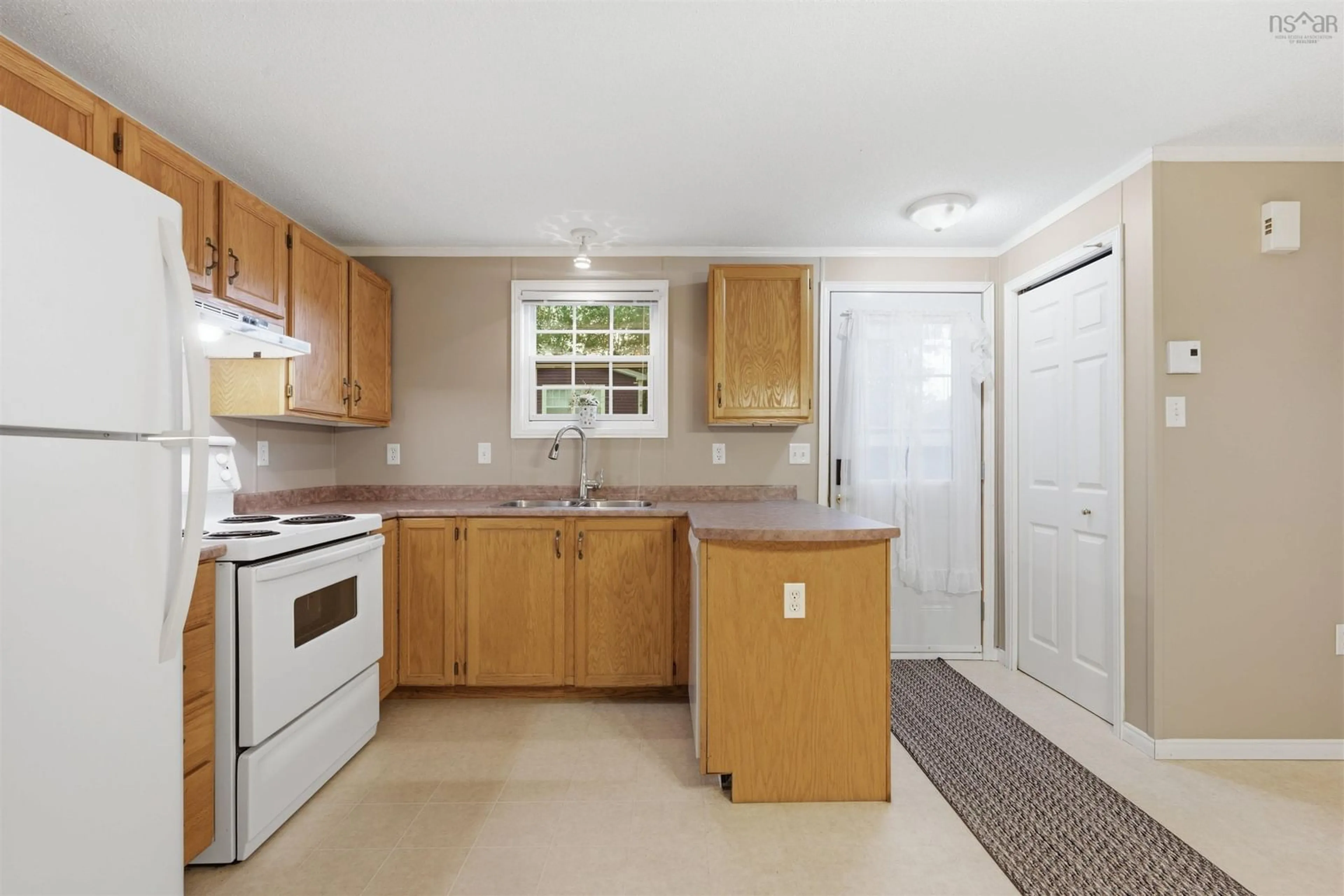 Standard kitchen, ceramic/tile floor for 1 Happy Dr, Lake Echo Nova Scotia B3E 1C3
