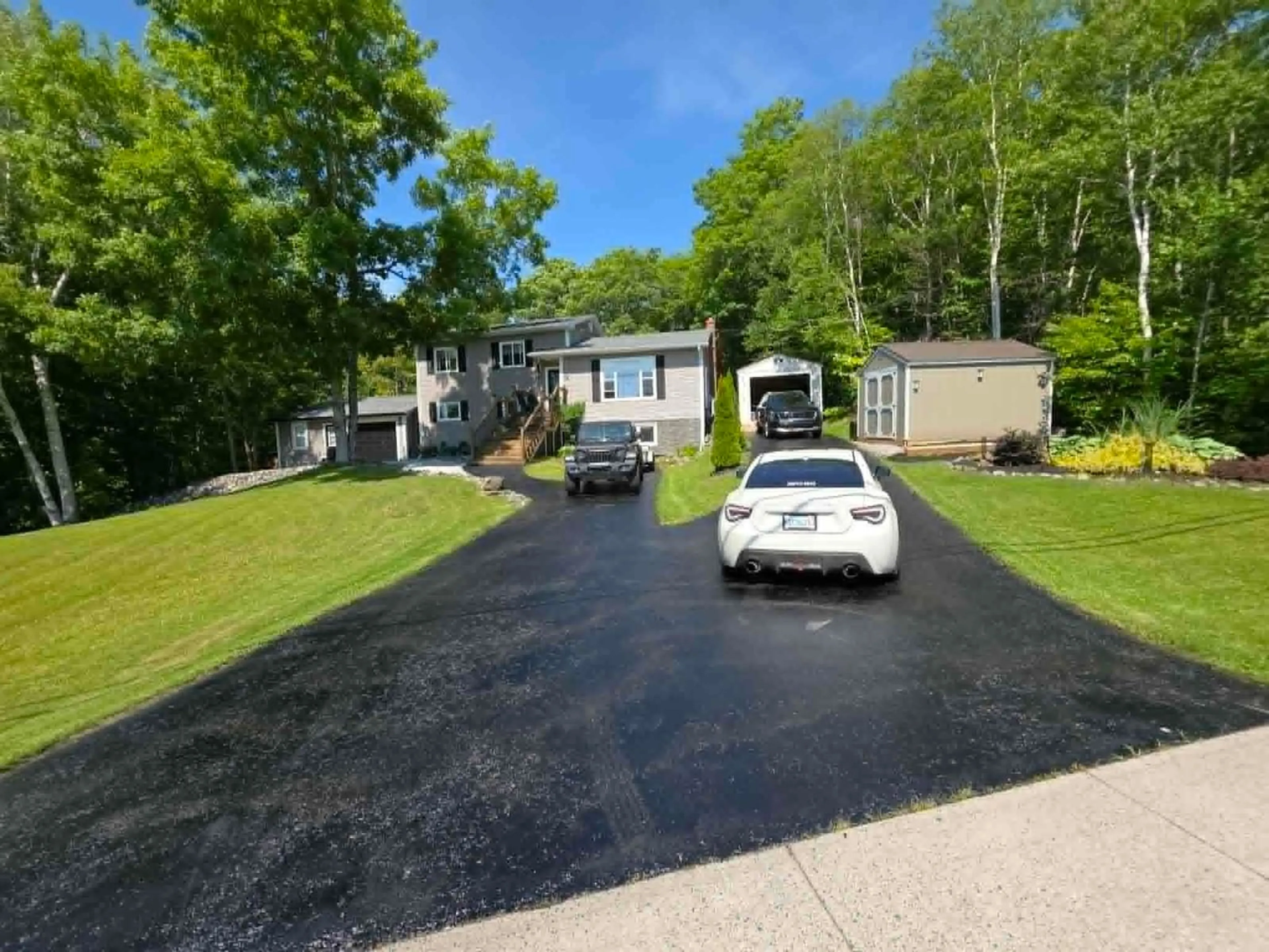 A pic from outside/outdoor area/front of a property/back of a property/a pic from drone, street for 205 Tometary Dr, Howie Centre Nova Scotia B1L 1G4