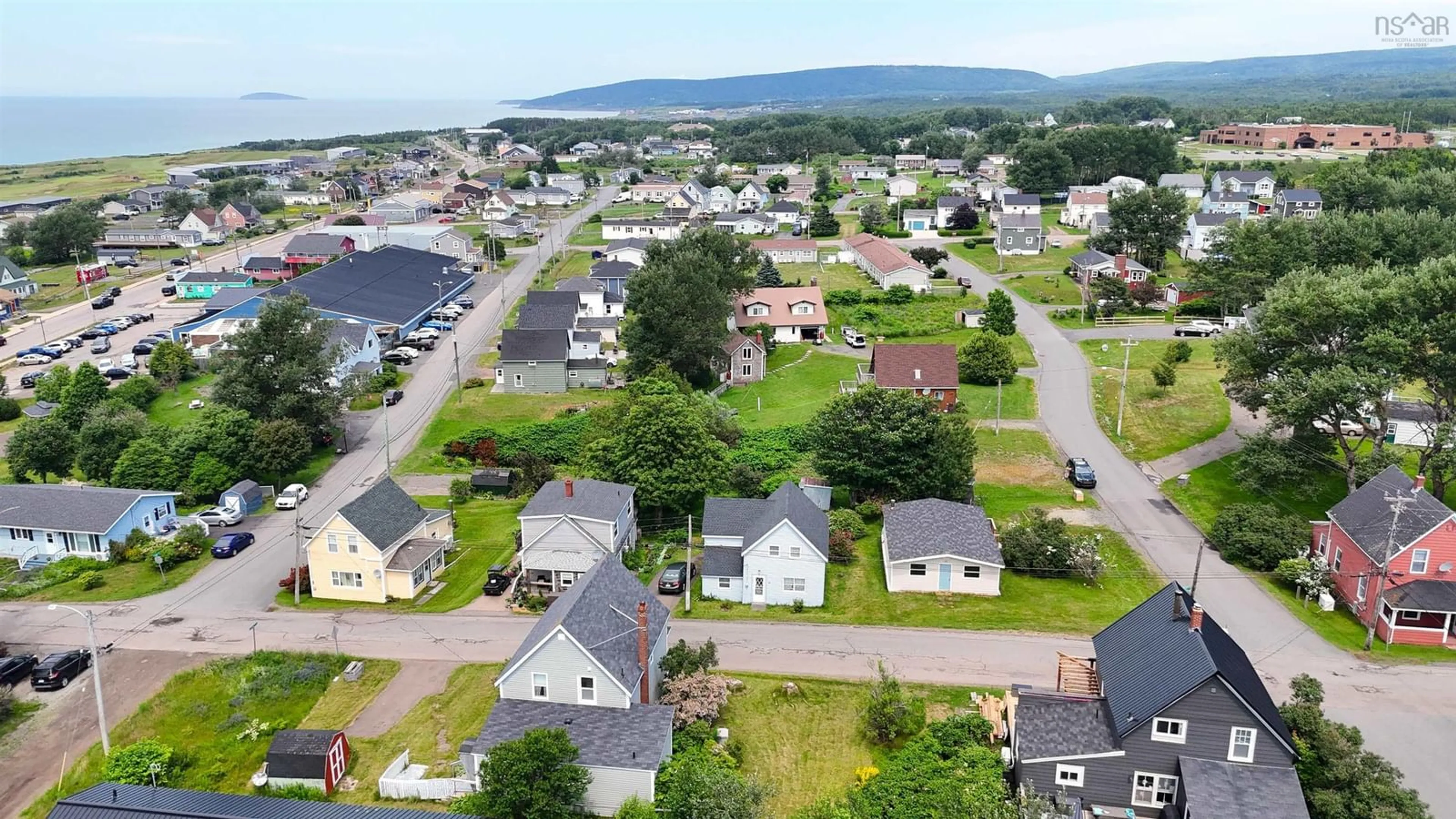 A pic from outside/outdoor area/front of a property/back of a property/a pic from drone, mountain view for 87 Church St, Inverness Nova Scotia B0E 1N0