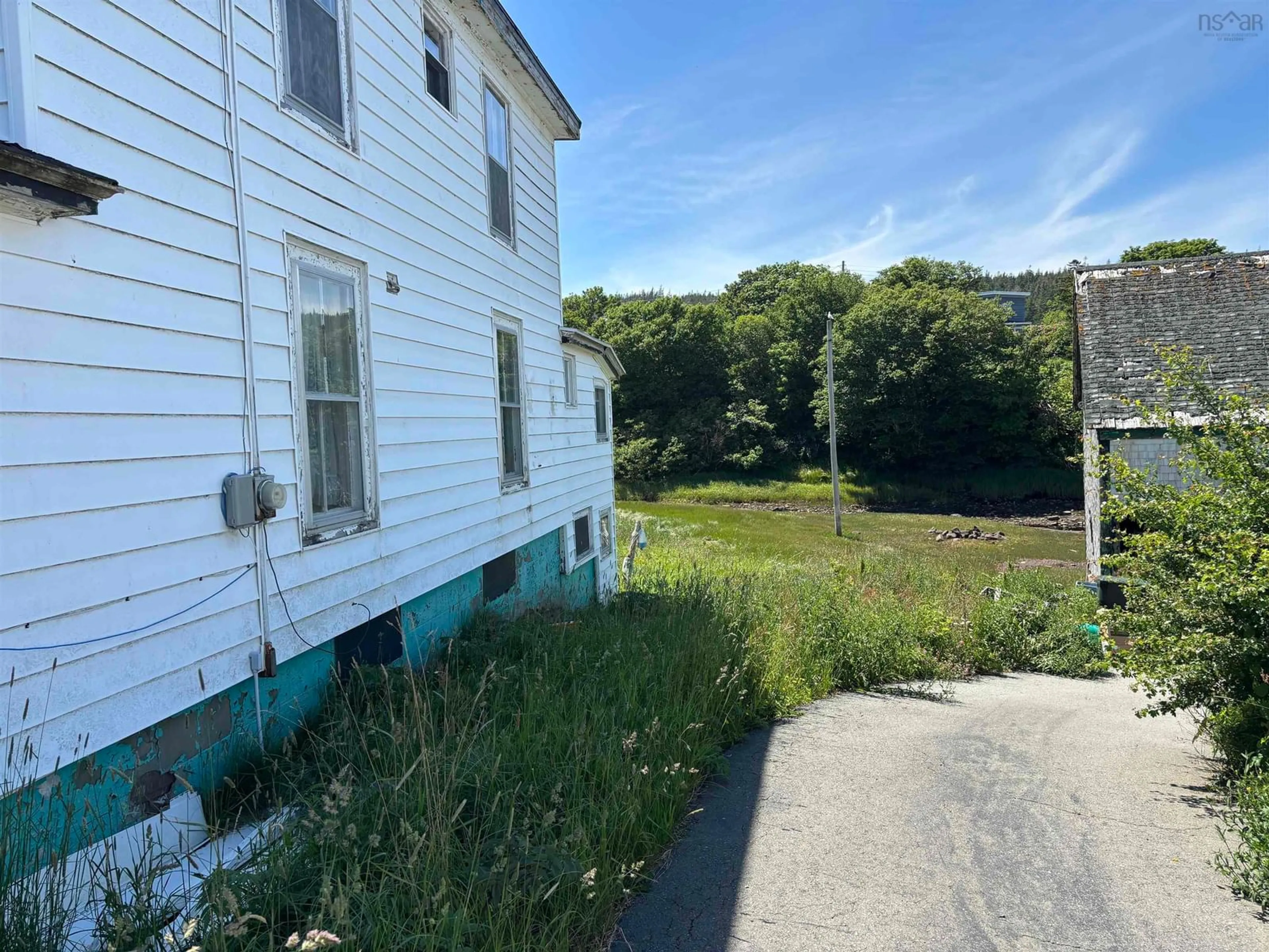 A pic from outside/outdoor area/front of a property/back of a property/a pic from drone, street for 3303 Highway 217, Tiverton Nova Scotia B0V 1G0