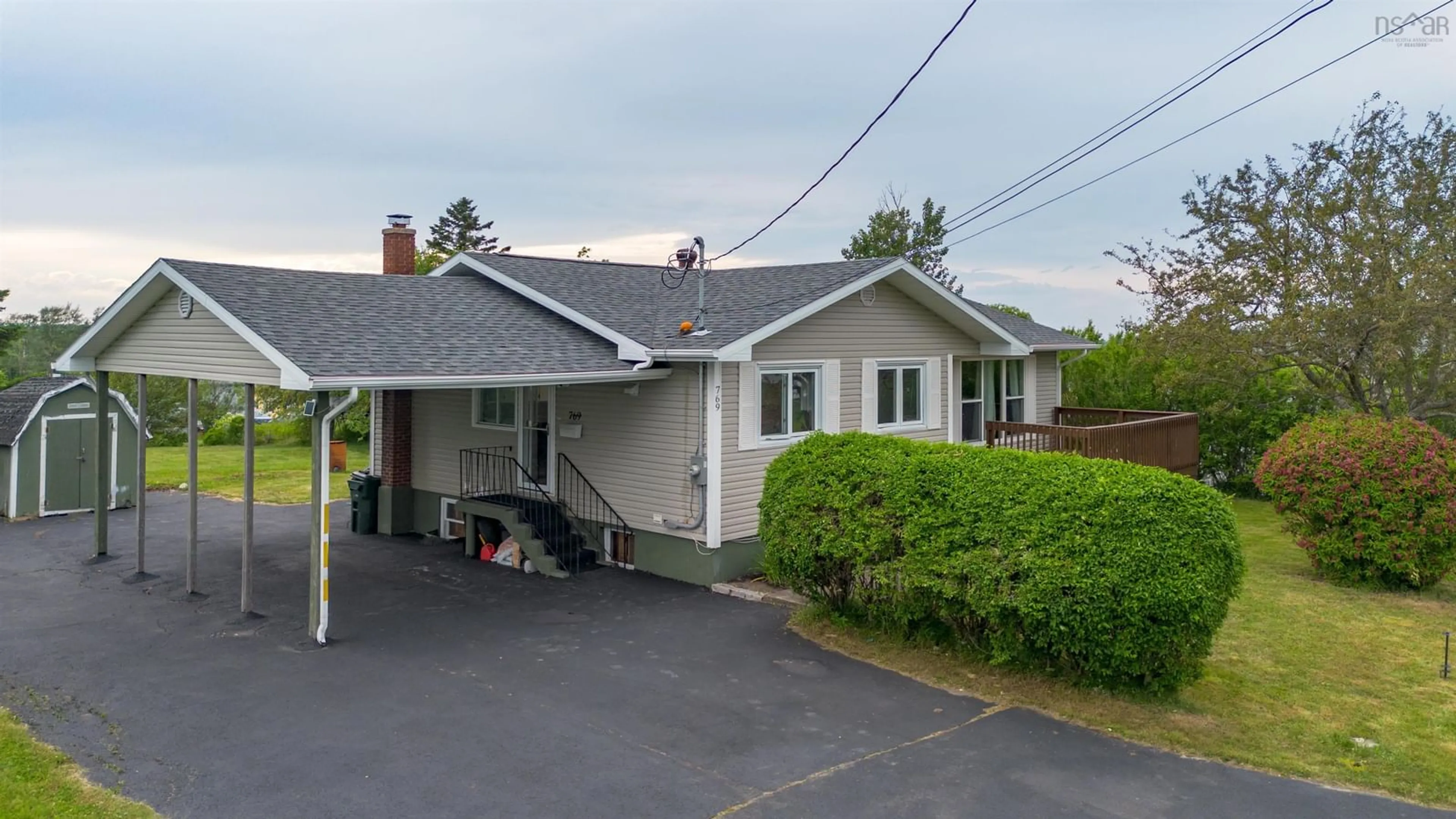 A pic from outside/outdoor area/front of a property/back of a property/a pic from drone, street for 769 Heelan St, New Waterford Nova Scotia B1H 3C6