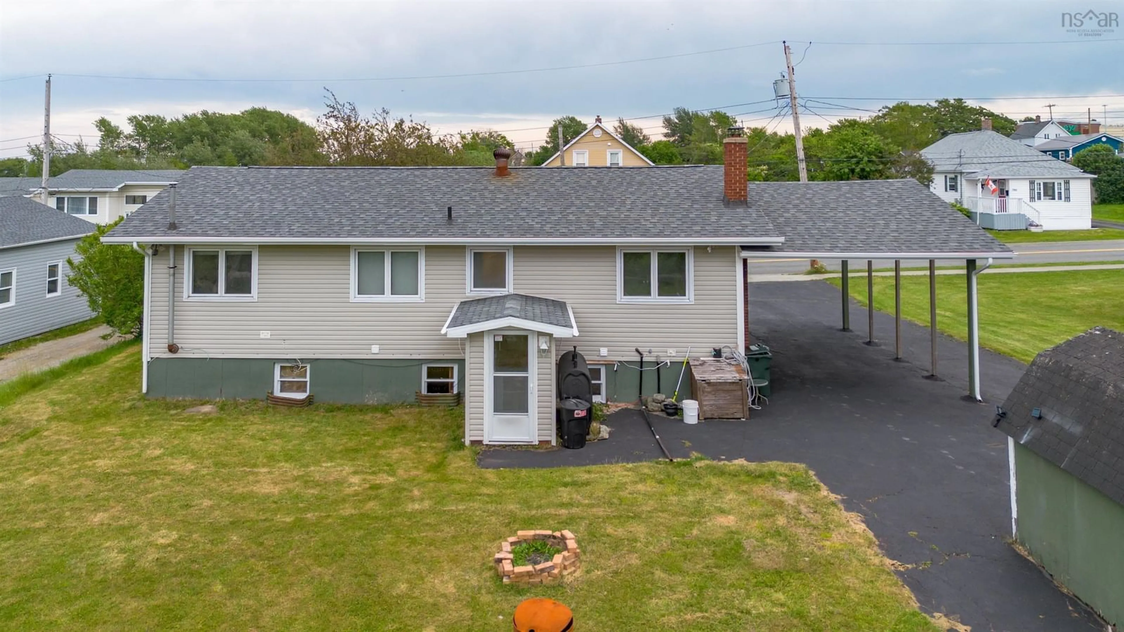 A pic from outside/outdoor area/front of a property/back of a property/a pic from drone, unknown for 769 Heelan St, New Waterford Nova Scotia B1H 3C6