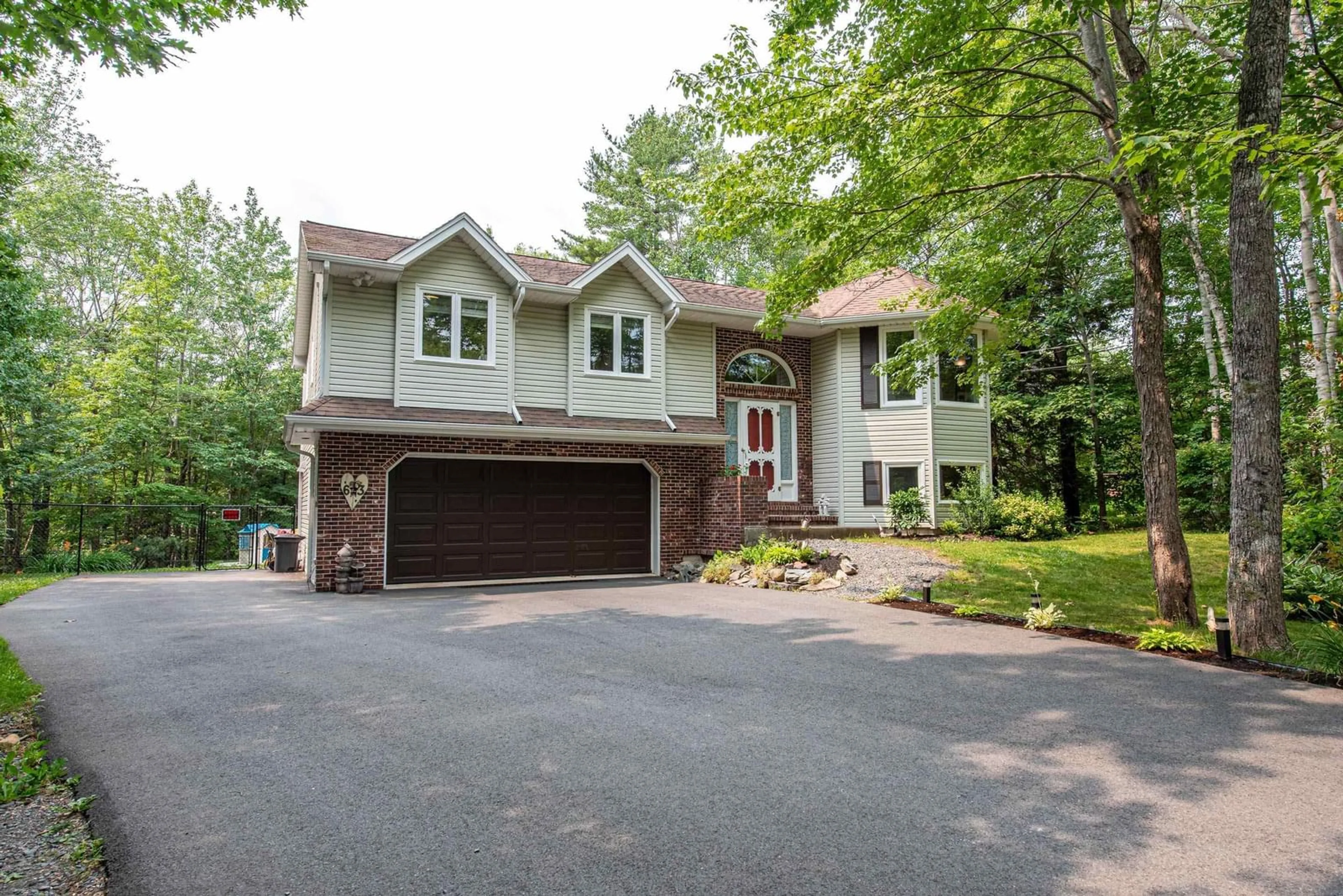 Home with vinyl exterior material, street for 63 Stone Mount Dr, Lower Sackville Nova Scotia B4C 4A2