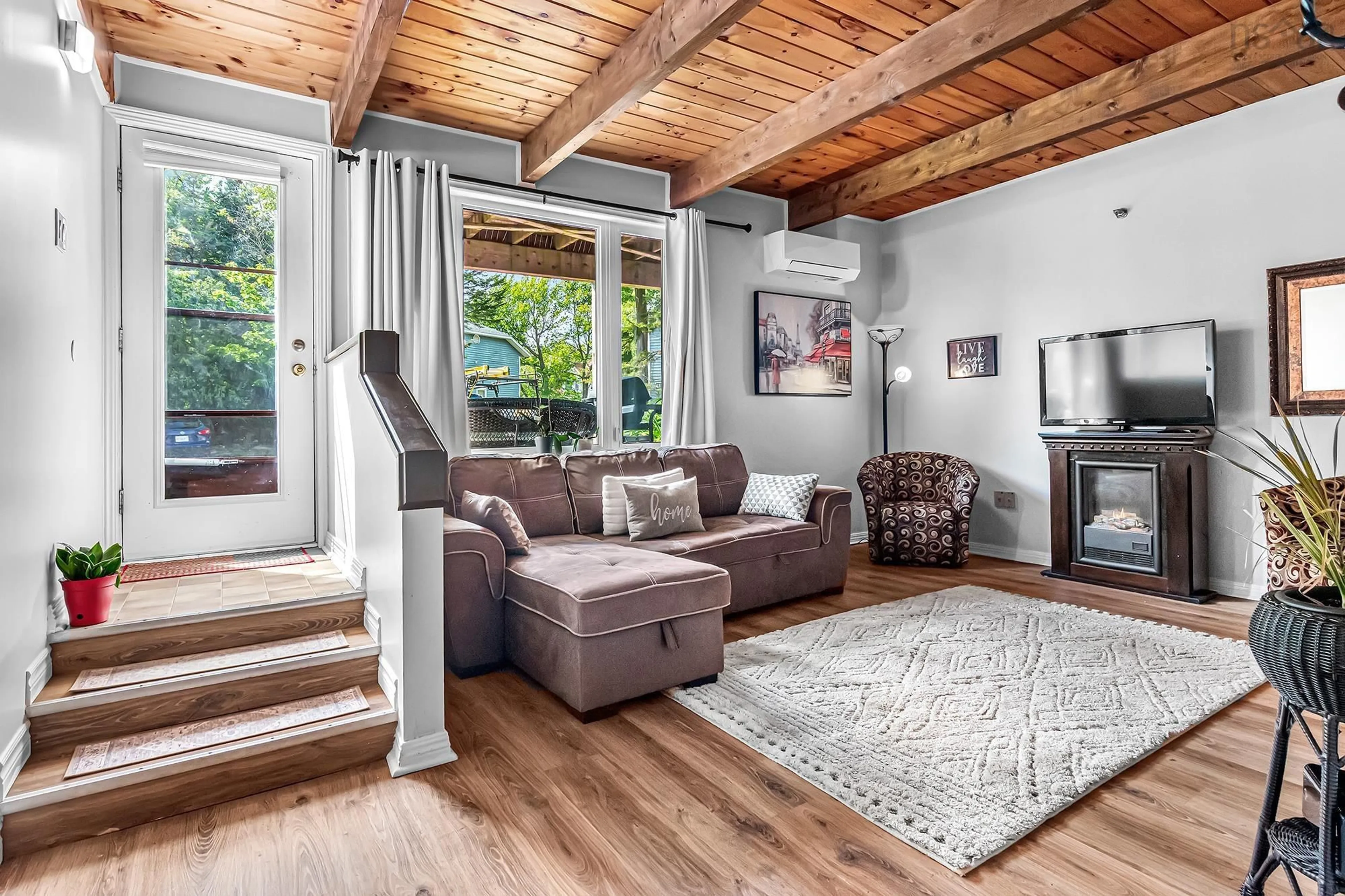 Living room with furniture, wood/laminate floor for 203 Ross St #105, Halifax Nova Scotia B3M 3Z2