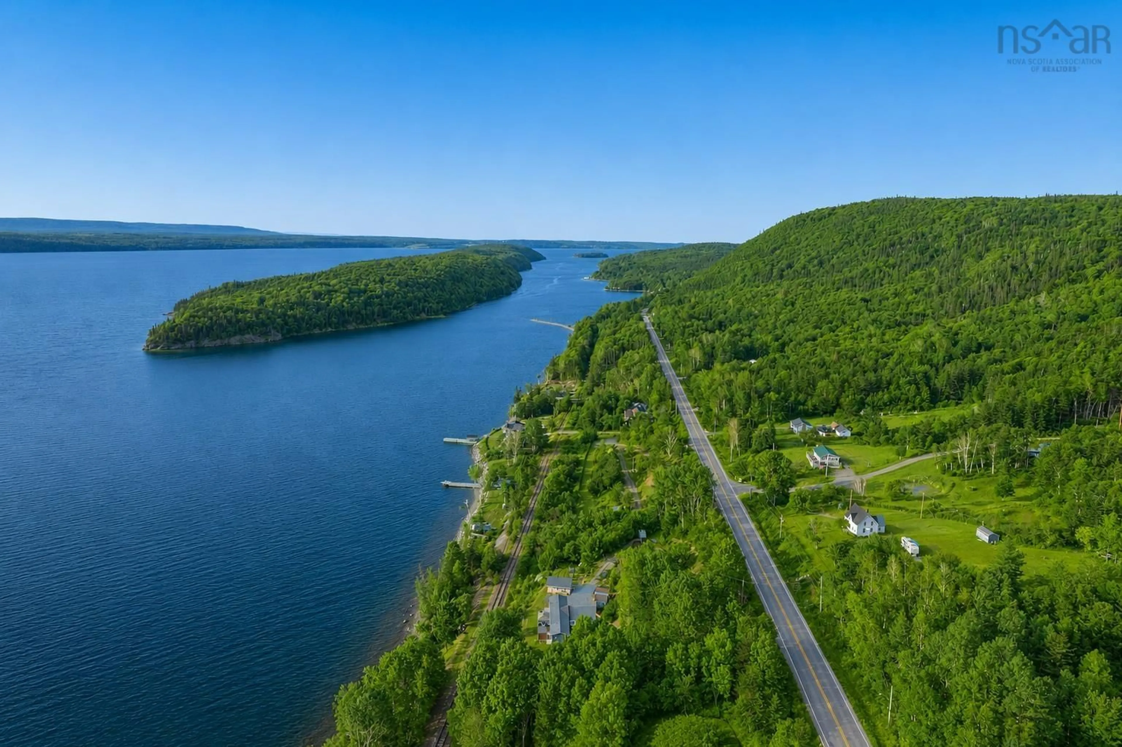 A pic from outside/outdoor area/front of a property/back of a property/a pic from drone, water/lake/river/ocean view for 3500 Long Island Rd, Long Island Nova Scotia B1Y 3N2