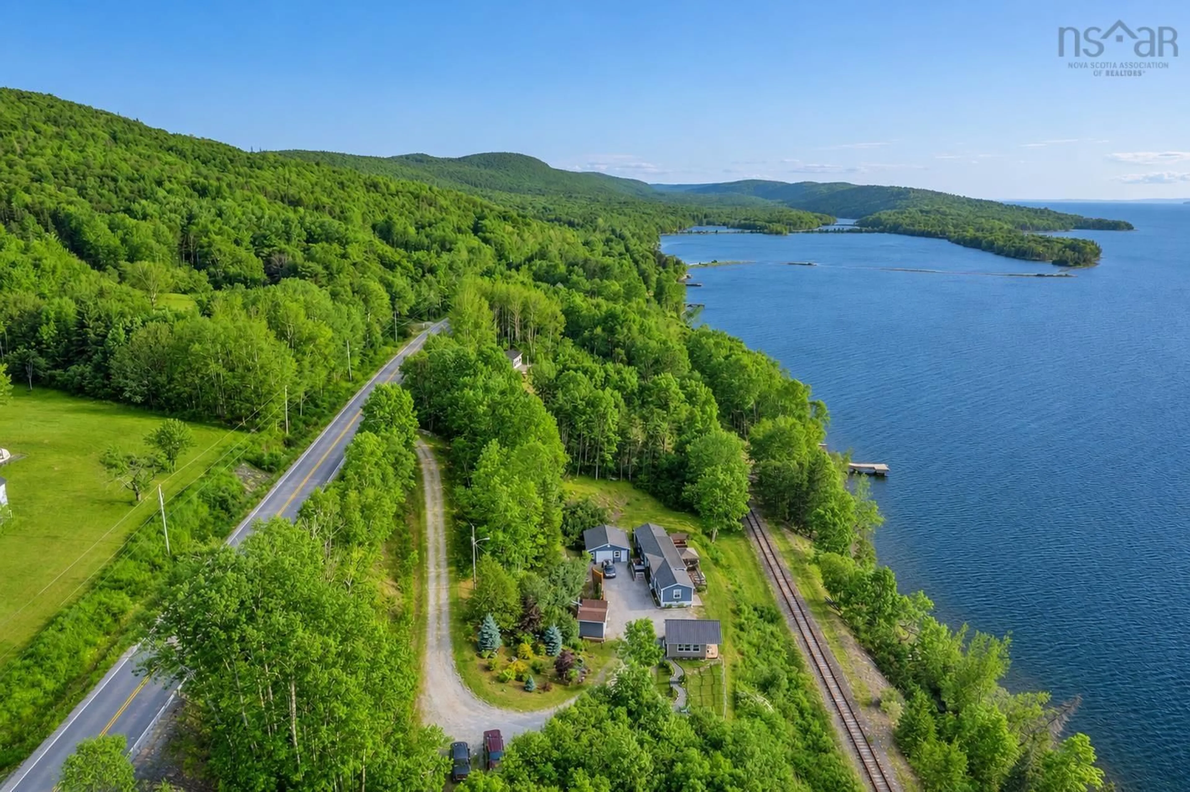 A pic from outside/outdoor area/front of a property/back of a property/a pic from drone, water/lake/river/ocean view for 3500 Long Island Rd, Long Island Nova Scotia B1Y 3N2