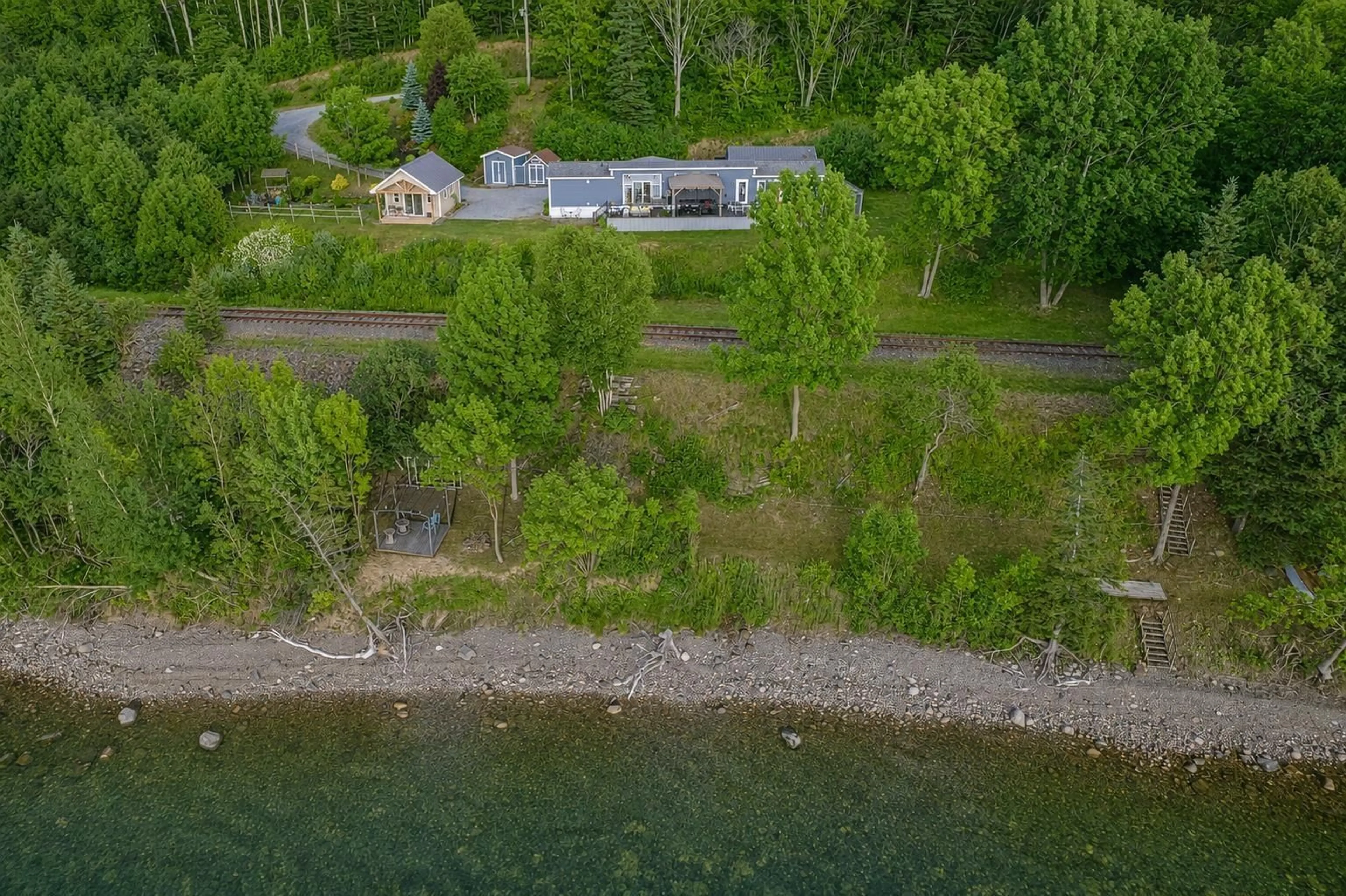 A pic from outside/outdoor area/front of a property/back of a property/a pic from drone, water/lake/river/ocean view for 3500 Long Island Rd, Long Island Nova Scotia B1Y 3N2