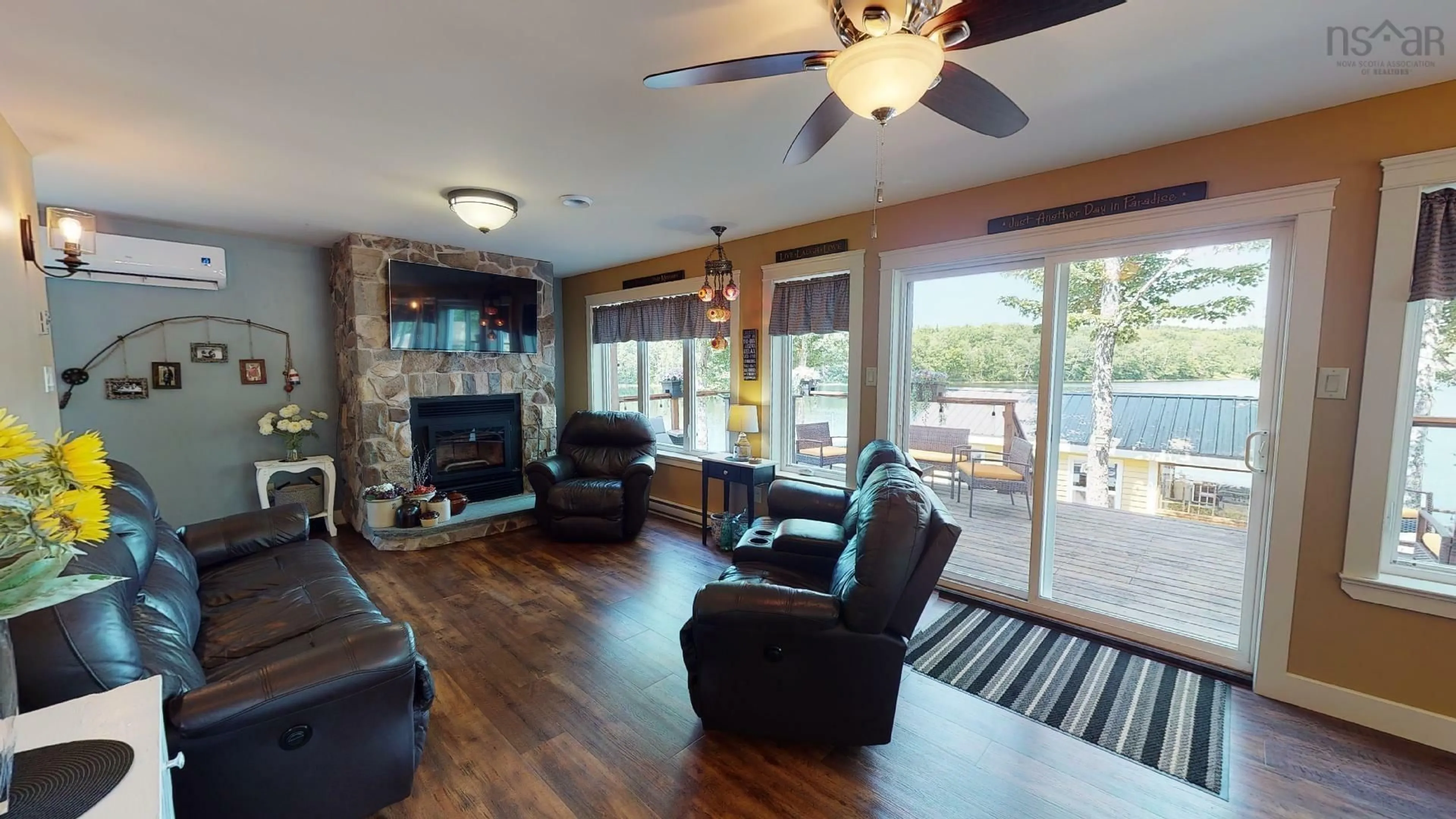 Living room with furniture, wood/laminate floor for 38 Sunset Lane, Goshen Nova Scotia B0H 1M0