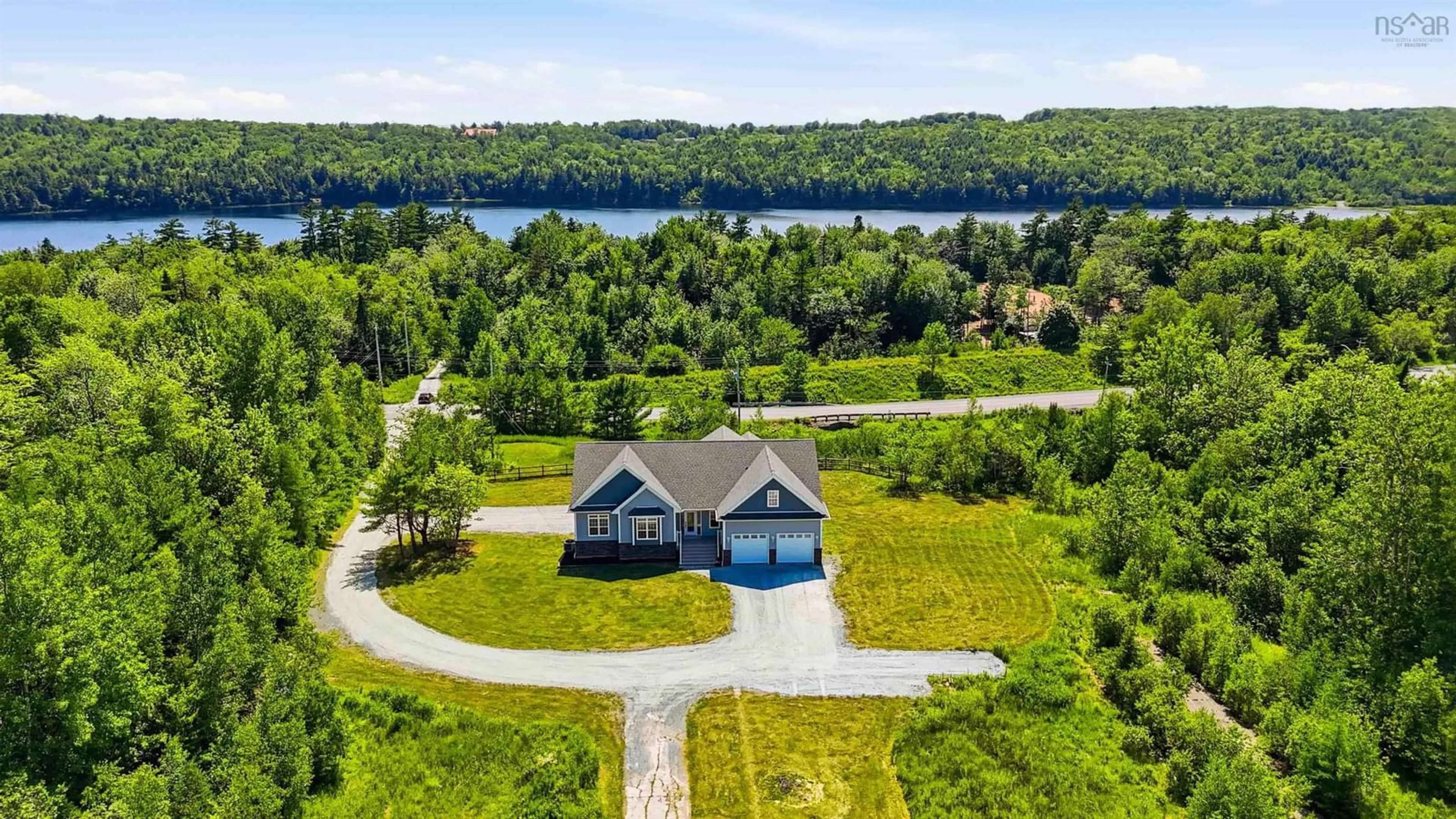 A pic from outside/outdoor area/front of a property/back of a property/a pic from drone, water/lake/river/ocean view for 339 Windgate Dr, Windsor Junction Nova Scotia B2T 1H4