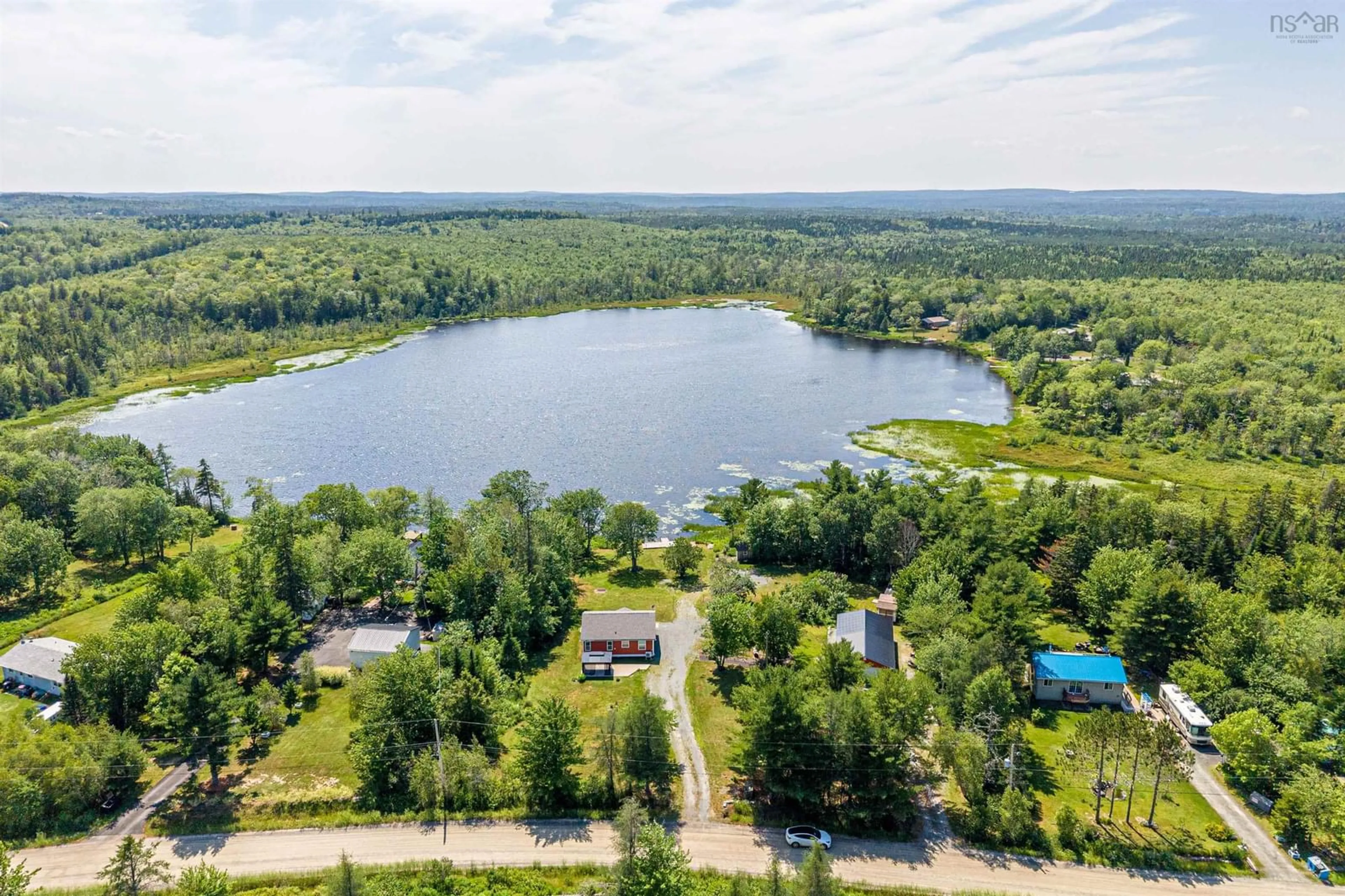 A pic from outside/outdoor area/front of a property/back of a property/a pic from drone, water/lake/river/ocean view for 60 Long Lake Rd, East Uniacke Nova Scotia B0N 0Z0