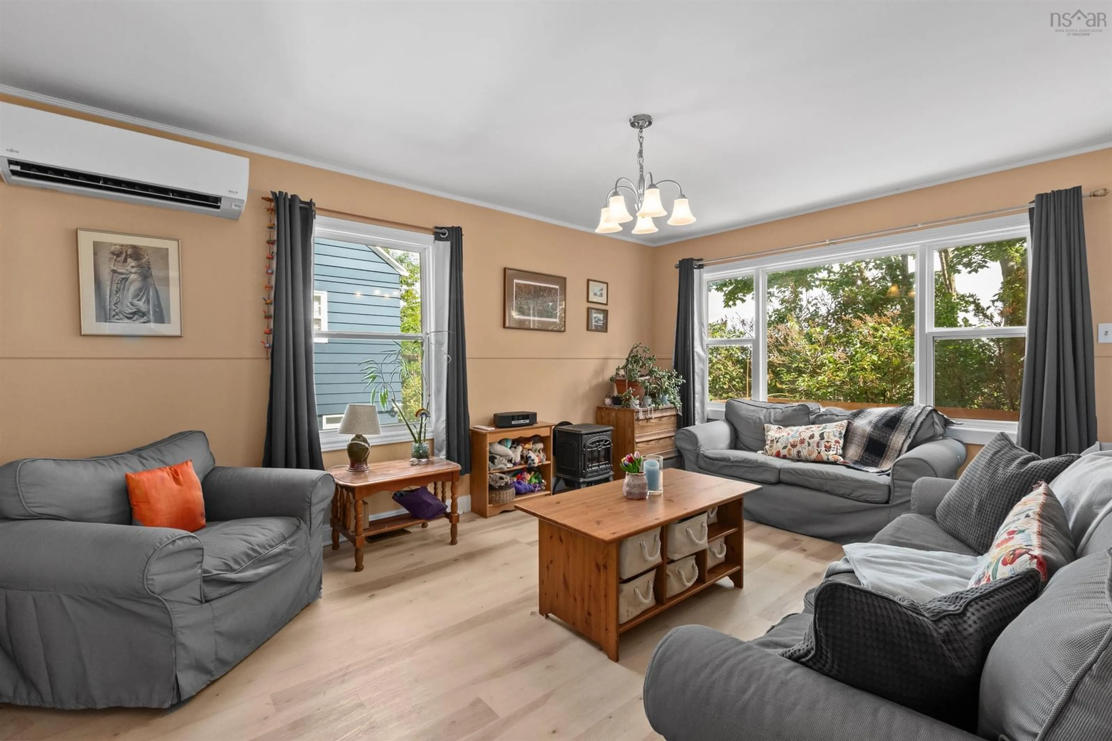 Living room with furniture, wood/laminate floor for 3636 Lynch, Halifax Peninsula Nova Scotia B3K 3I2