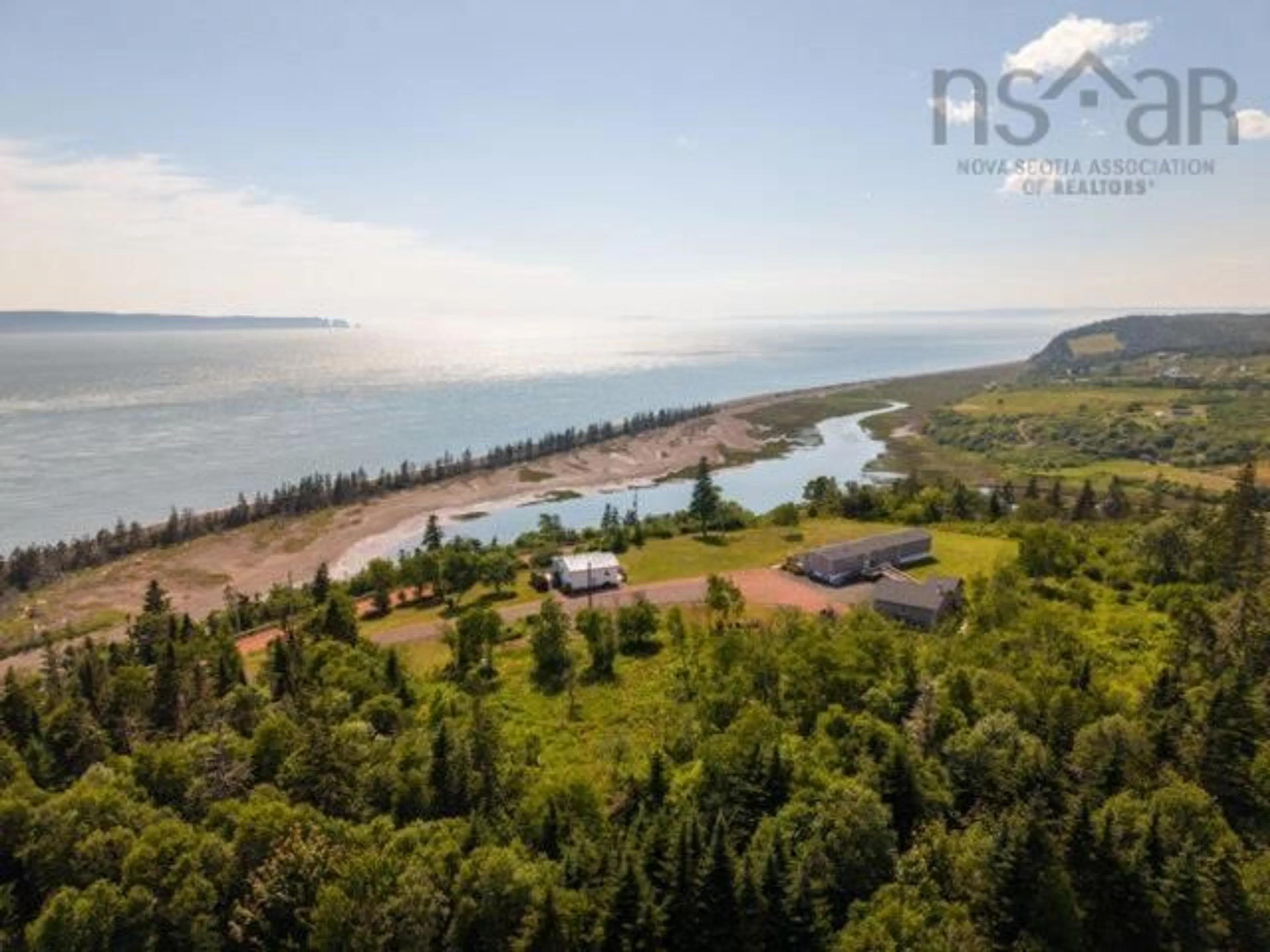 A pic from outside/outdoor area/front of a property/back of a property/a pic from drone, water/lake/river/ocean view for 1031 West Bay Rd, West Bay Nova Scotia B0M 1S0