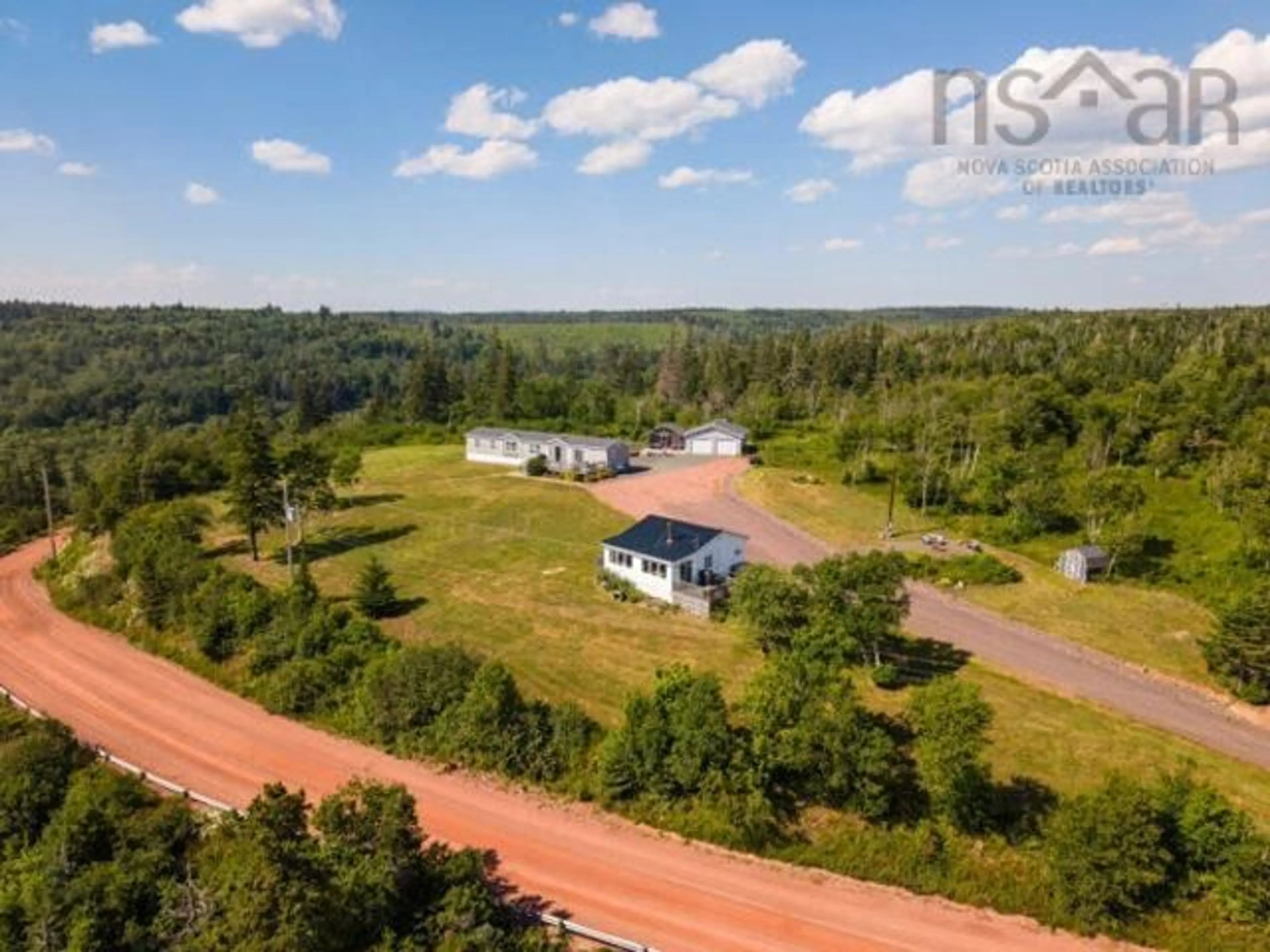 A pic from outside/outdoor area/front of a property/back of a property/a pic from drone, unknown for 1031 West Bay Rd, West Bay Nova Scotia B0M 1S0